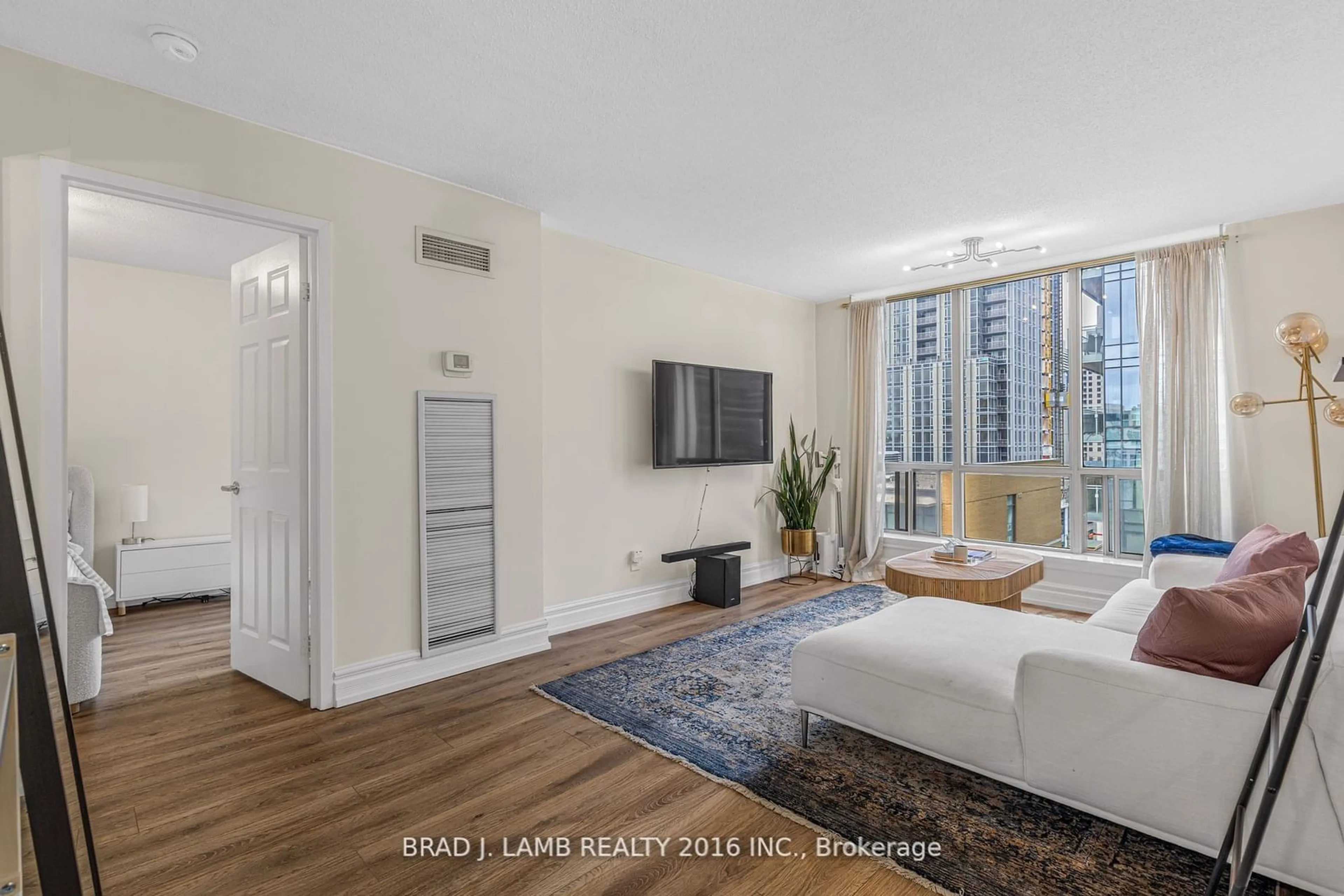 Living room, wood floors for 40 Scollard St #907, Toronto Ontario M5R 3S1