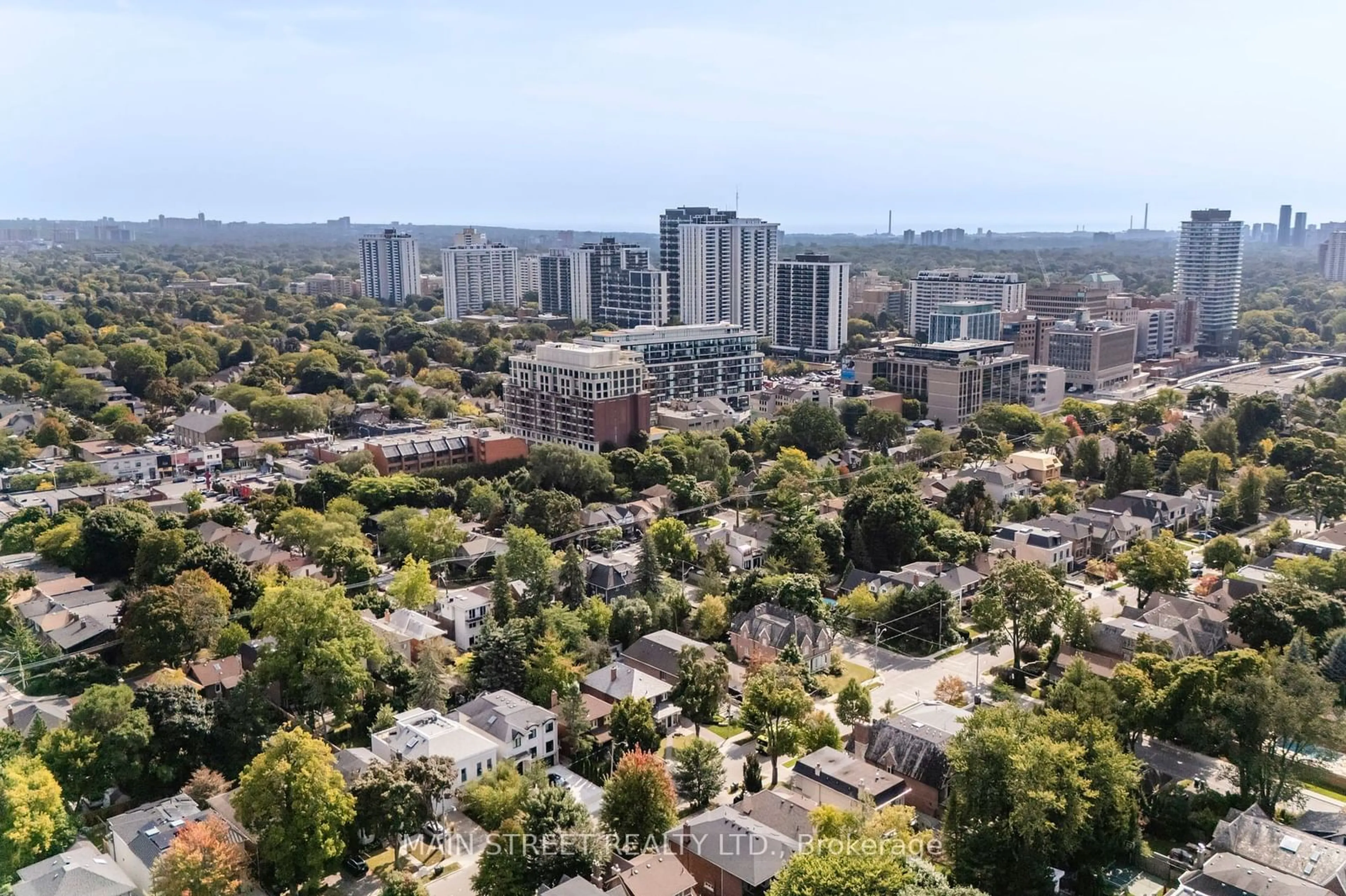 A pic from outside/outdoor area/front of a property/back of a property/a pic from drone, city buildings view from balcony for 73 Colin Ave, Toronto Ontario M5P 2C1