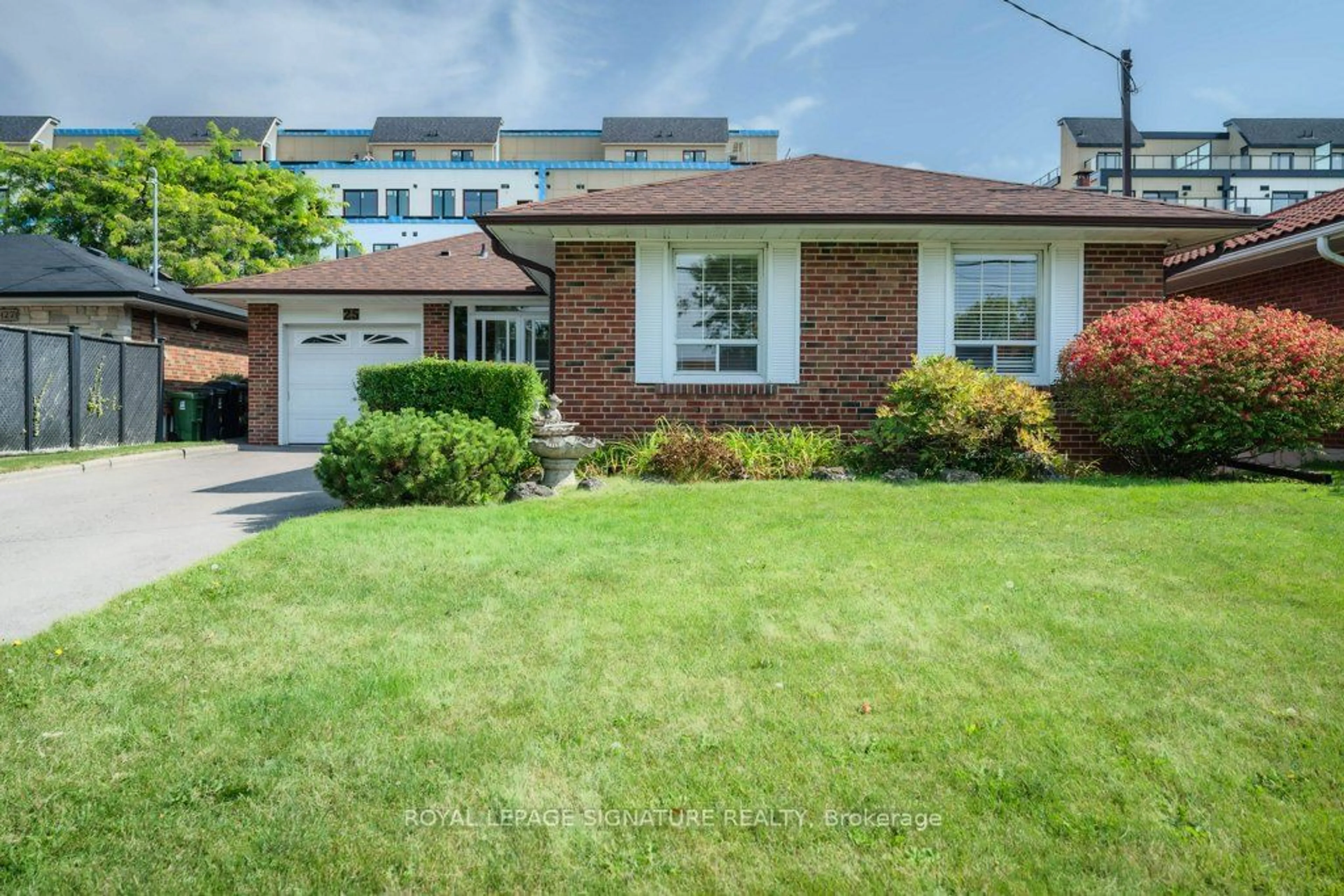 Frontside or backside of a home for 25 Wigmore Dr, Toronto Ontario M4A 2E4