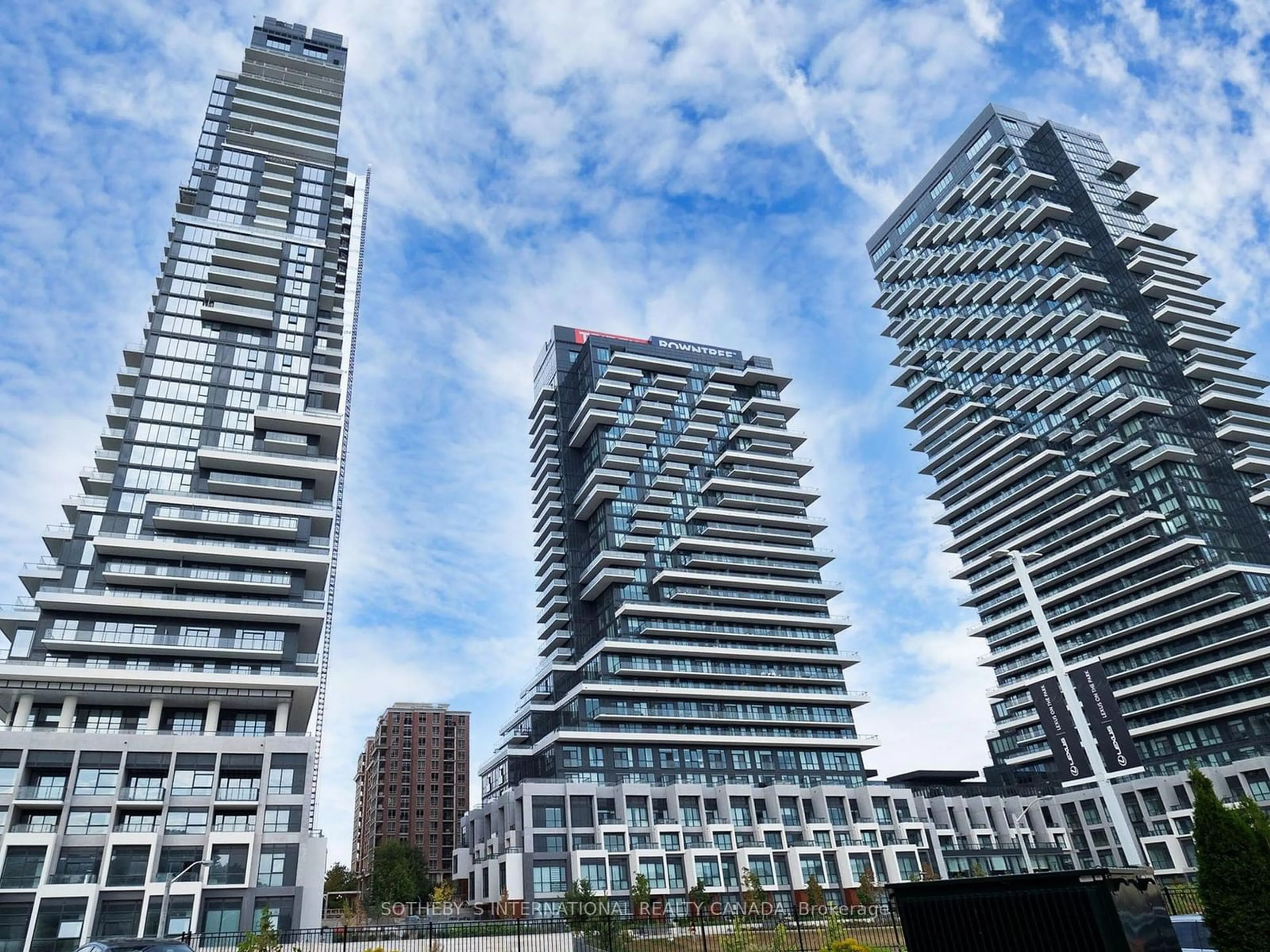 A pic from exterior of the house or condo, the view of city buildings for 30 Inn On the Park Dr #518, Toronto Ontario M3C 0P7