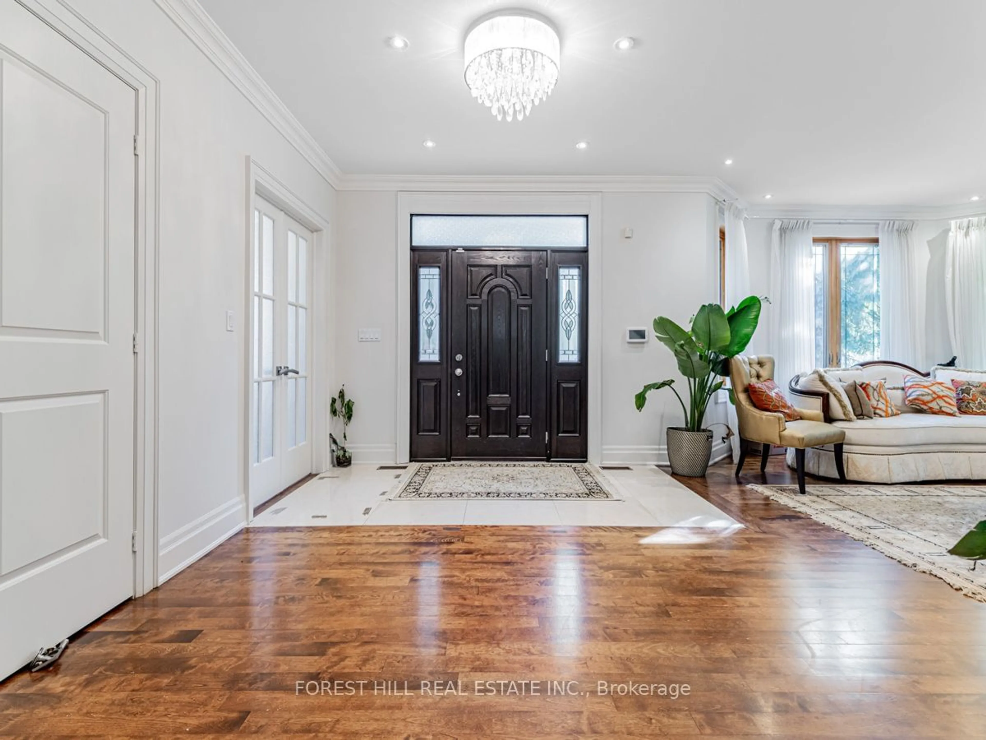 Indoor entryway, wood floors for 73 Larkfield Dr, Toronto Ontario M3B 2H4