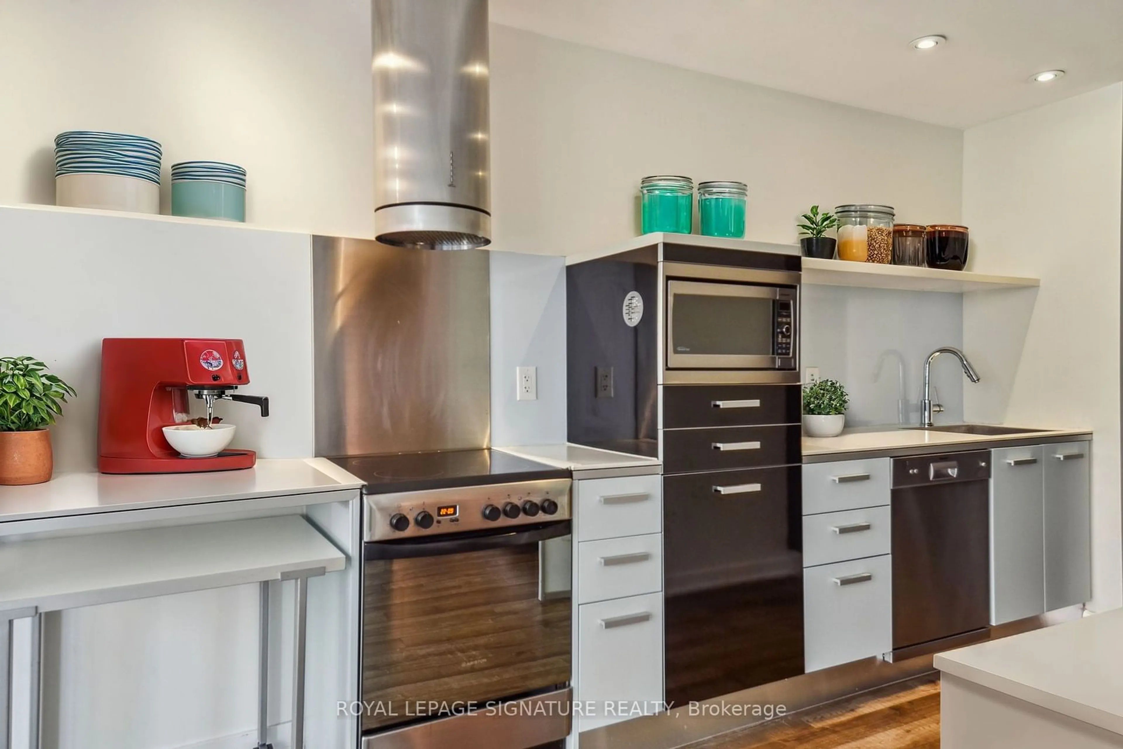 Contemporary kitchen, wood floors for 38 Dan Leckie Way #223, Toronto Ontario M5V 2V6