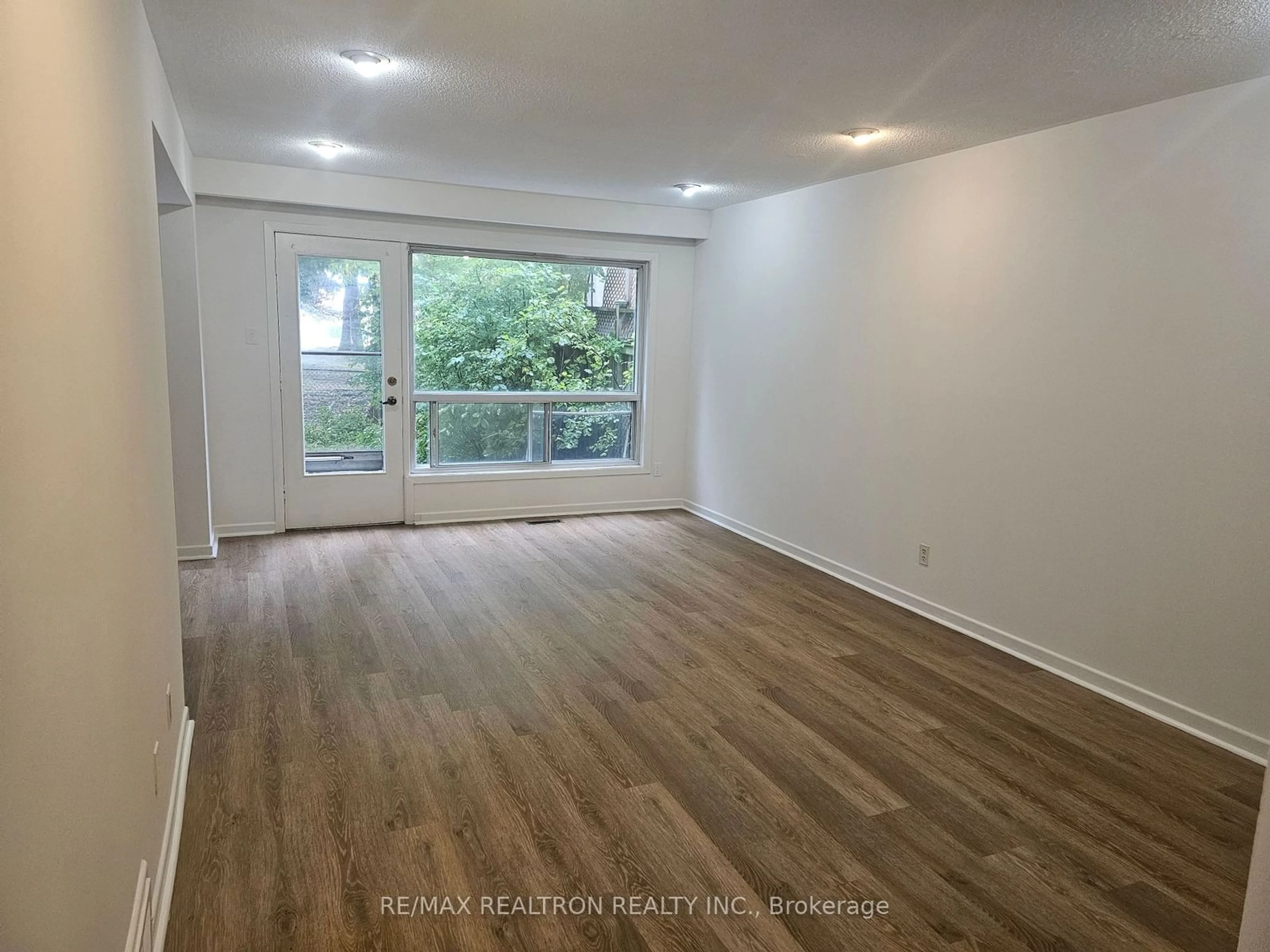 A pic of a room, wood floors for 92 Tanjoe Cres, Toronto Ontario M2M 1P7