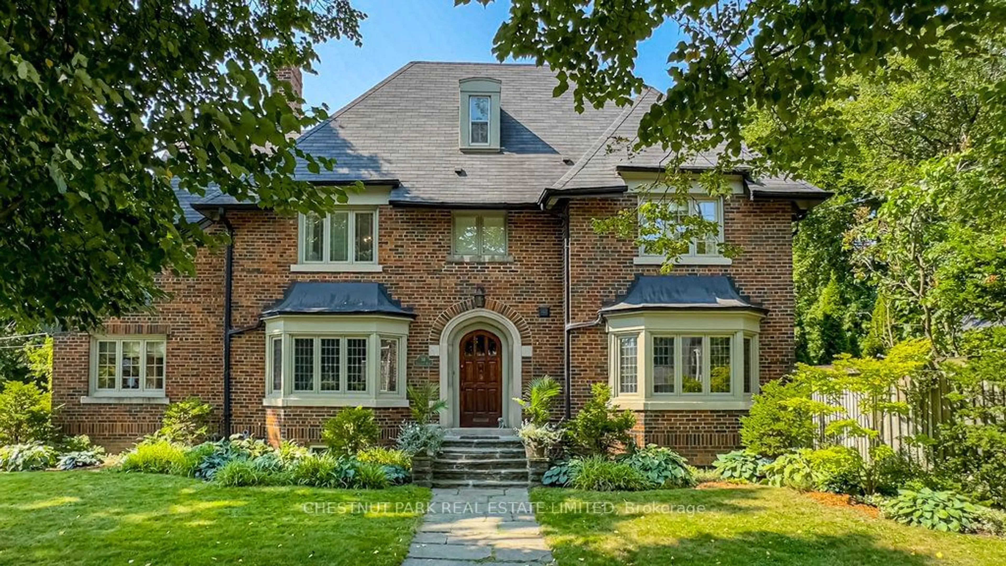 Home with brick exterior material for 38 Lascelles Blvd, Toronto Ontario M5P 2E1