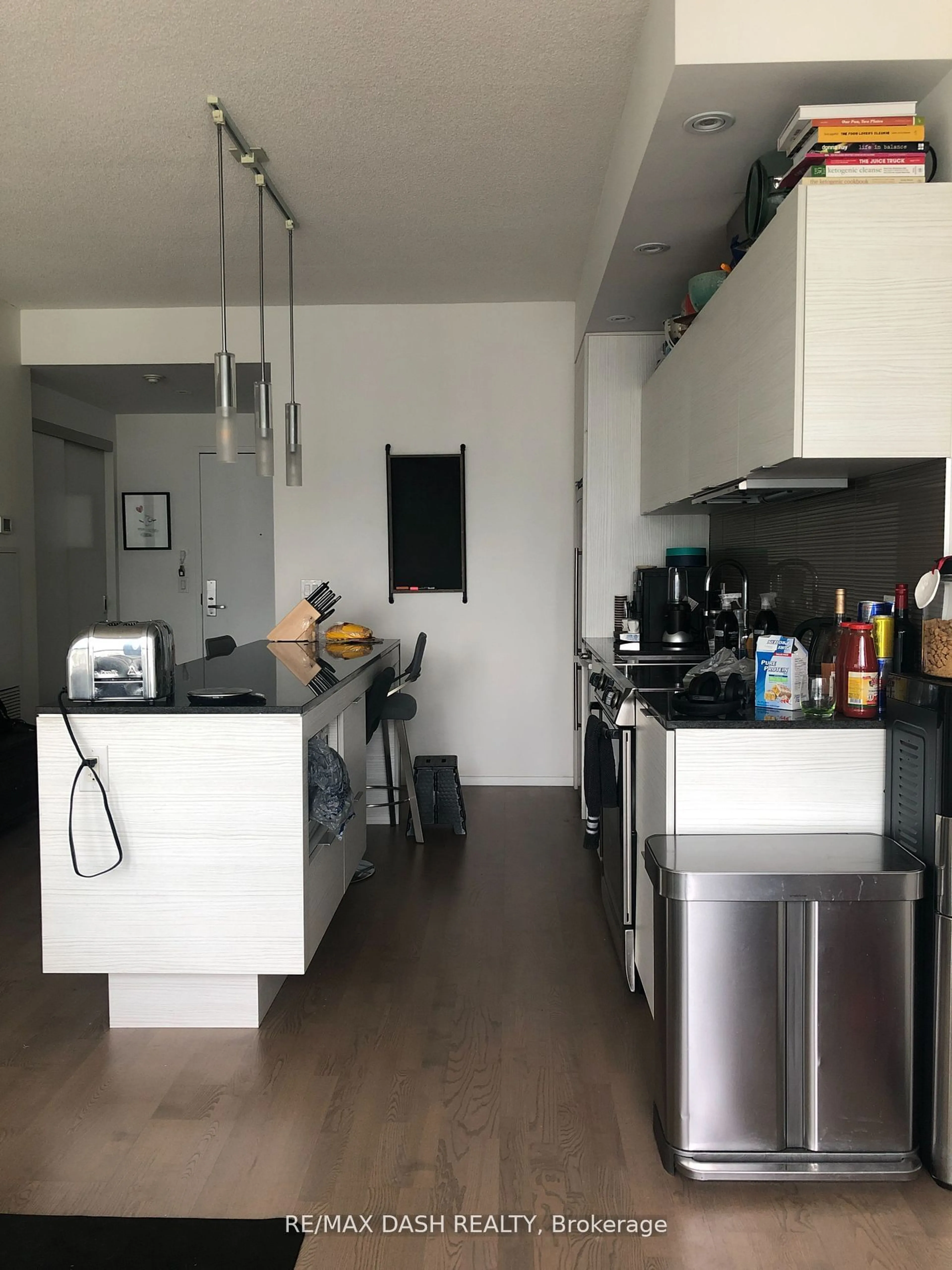 Kitchen, wood floors for 8 Charlotte St #2405, Toronto Ontario M5V 0K4