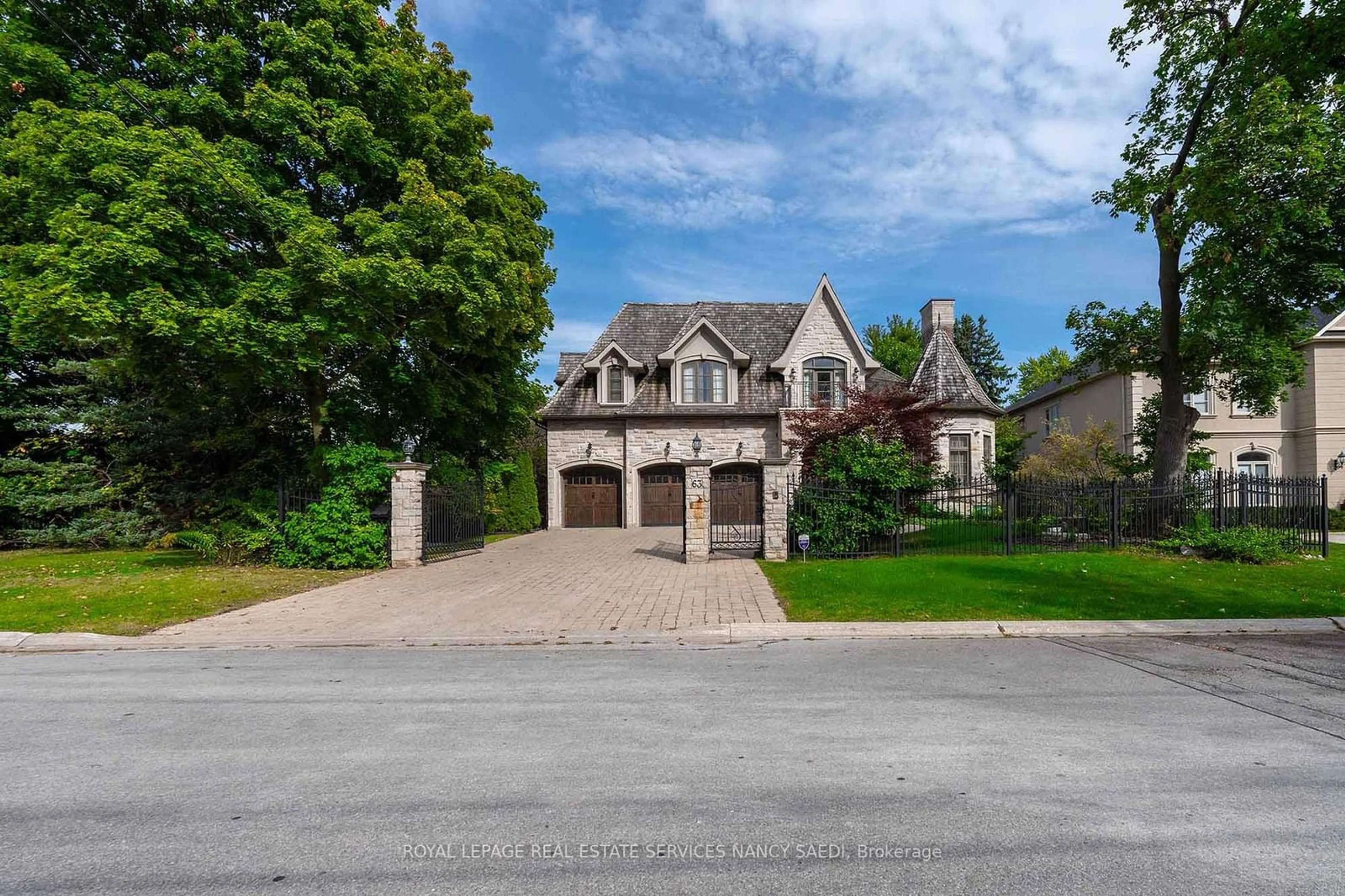 Frontside or backside of a home, the street view for 63 Rollscourt Dr, Toronto Ontario M2L 1Y1