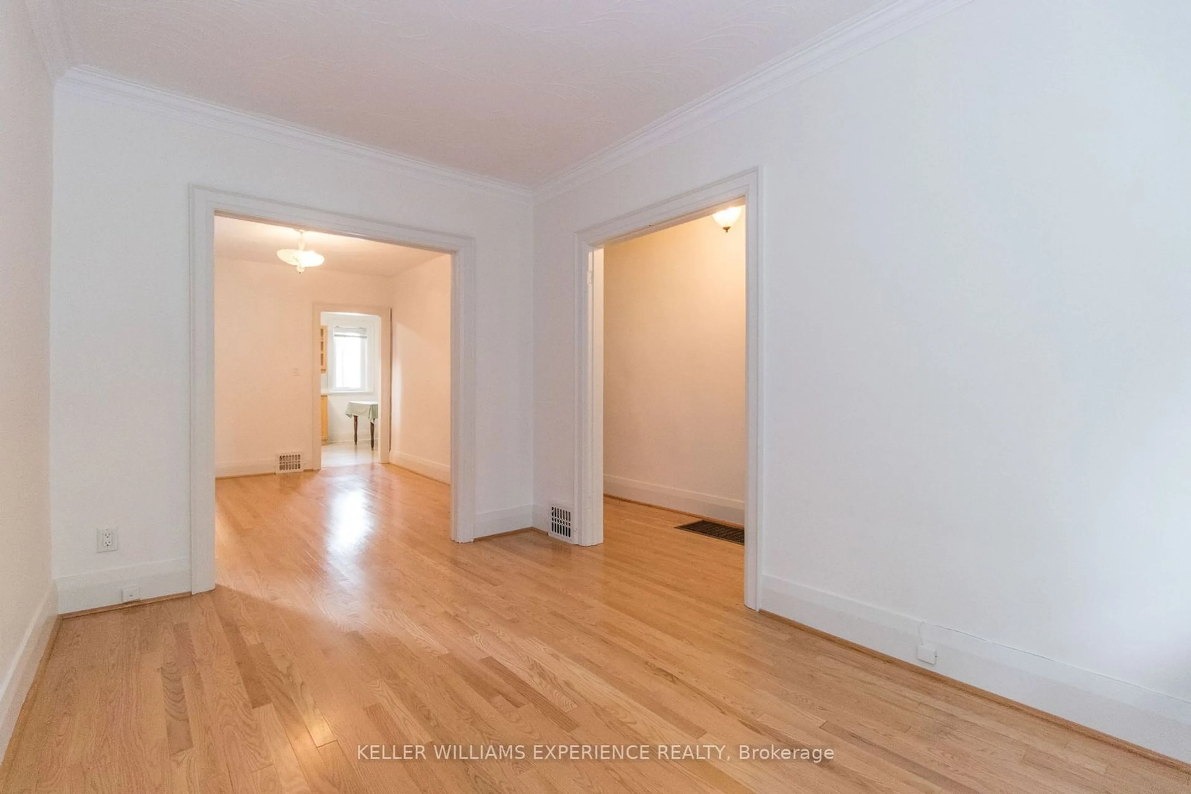 A pic of a room, wood floors for 290 Arlington Ave, Toronto Ontario M6C 2Z7