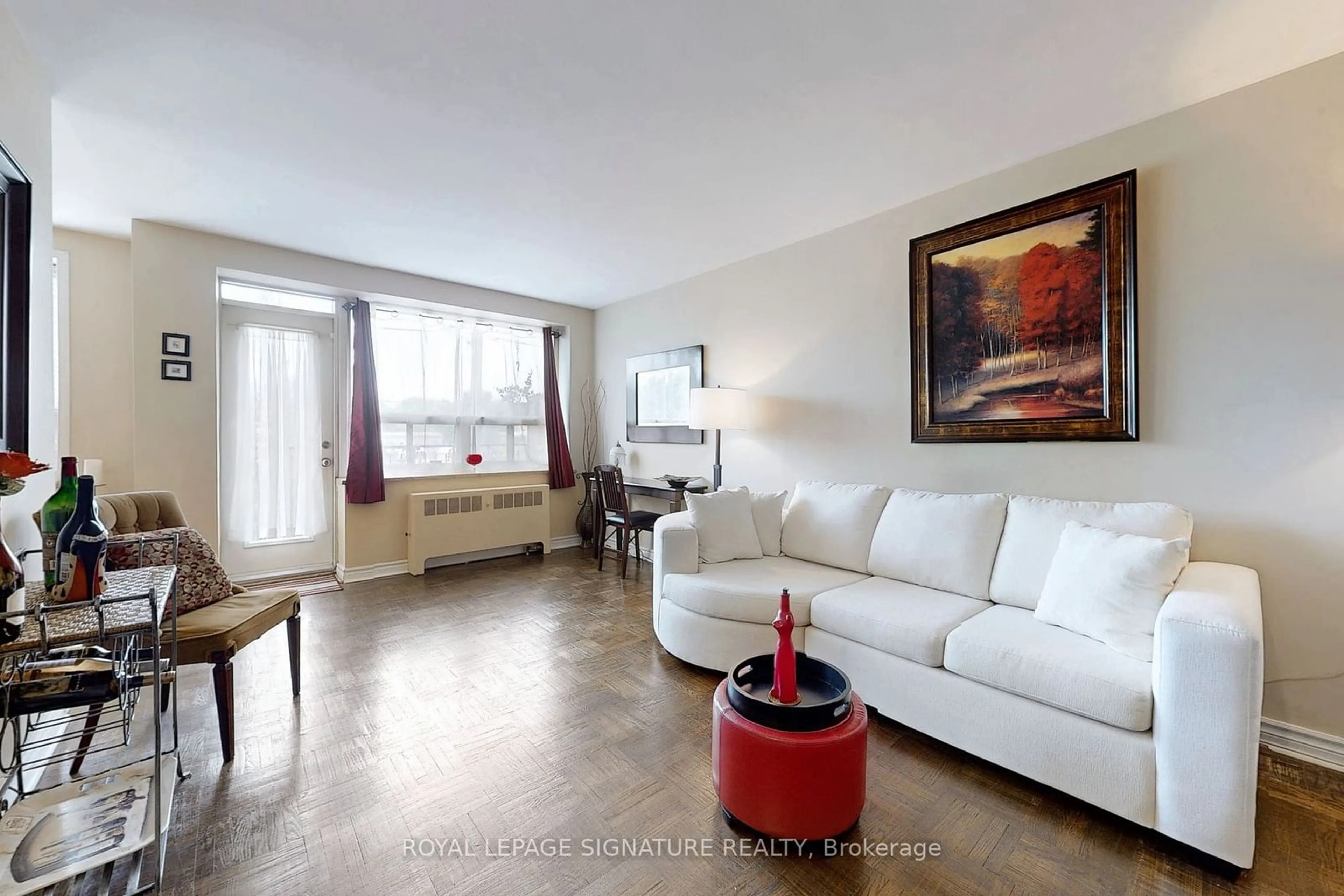 Living room, wood floors for 219 Wilson Ave #205, Toronto Ontario M5M 3B2