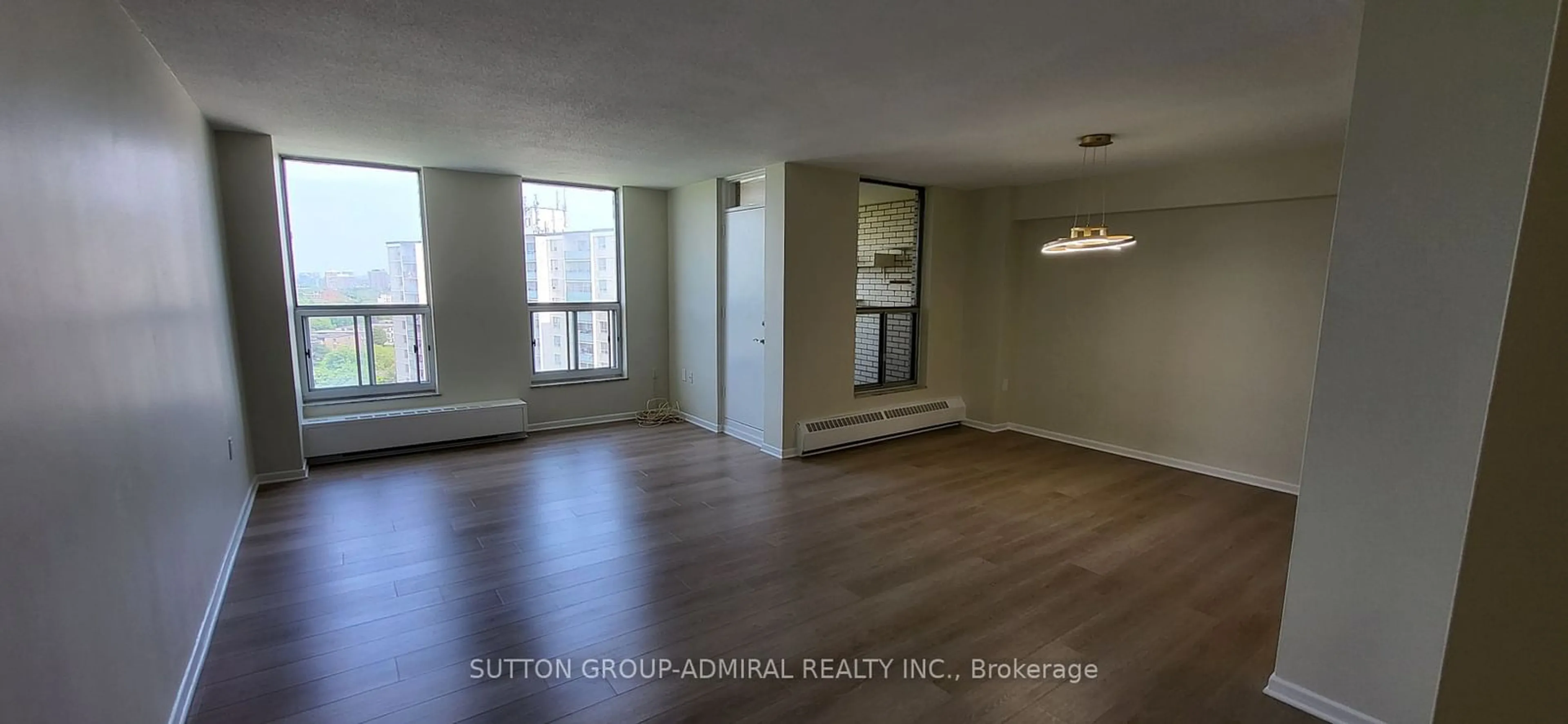 A pic of a room, wood floors for 130 Neptune Dr #1409, Toronto Ontario M6A 1X5