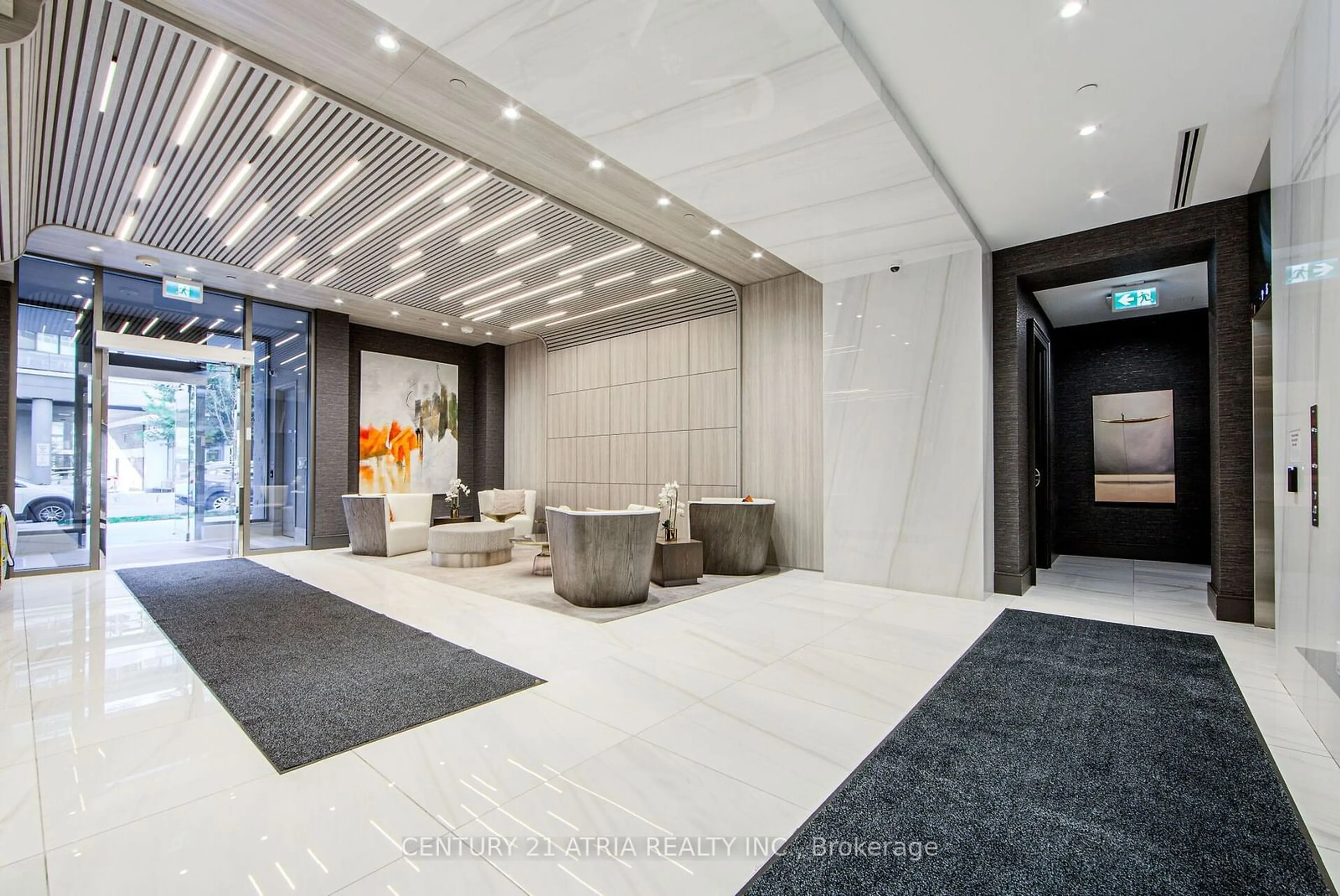 Indoor lobby, cement floor for 75 Canterbury Pl #317, Toronto Ontario M2N 0L2