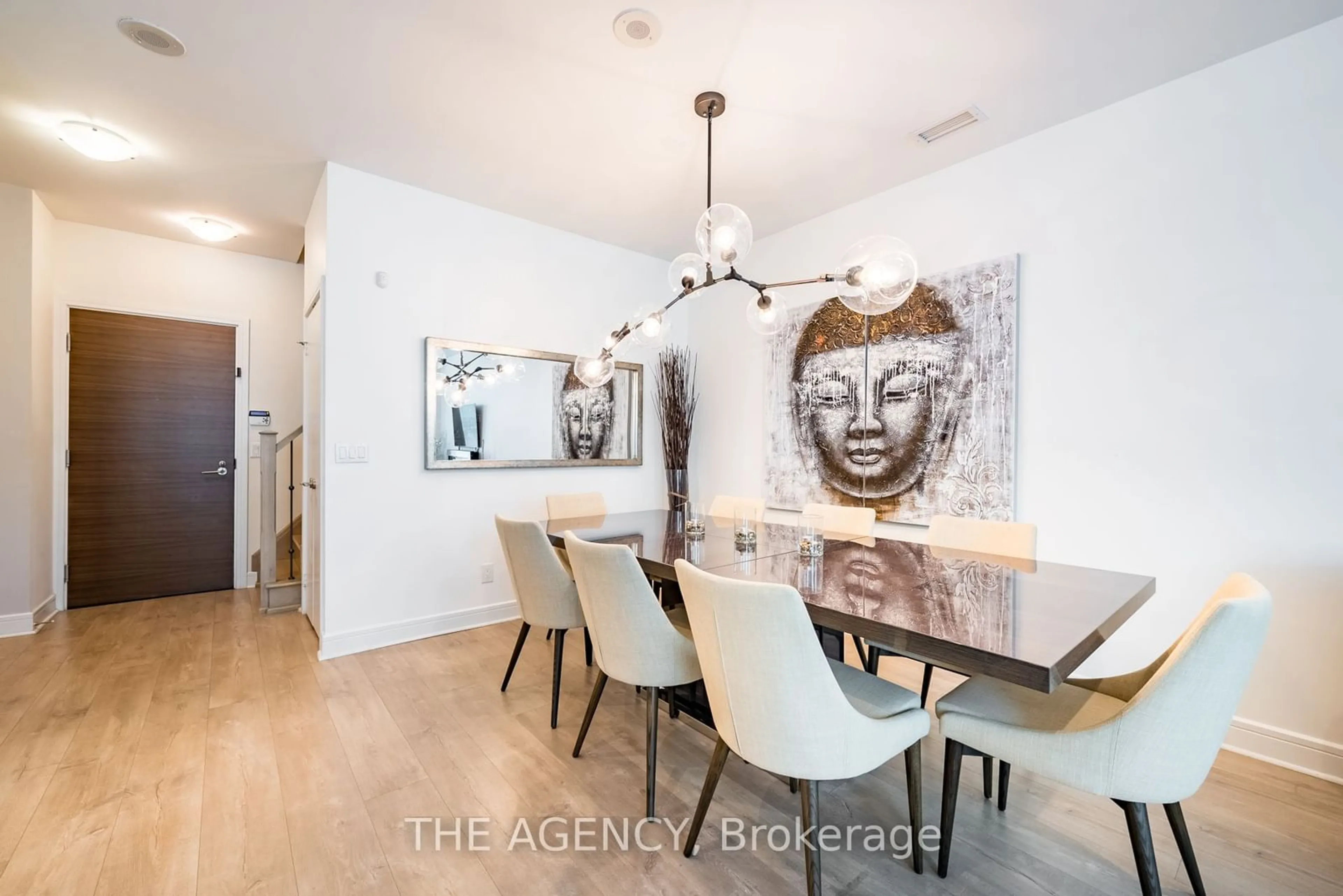 Dining room, wood floors, the street view for 35 Brian Peck Cres #TH113, Toronto Ontario M4G 0A5