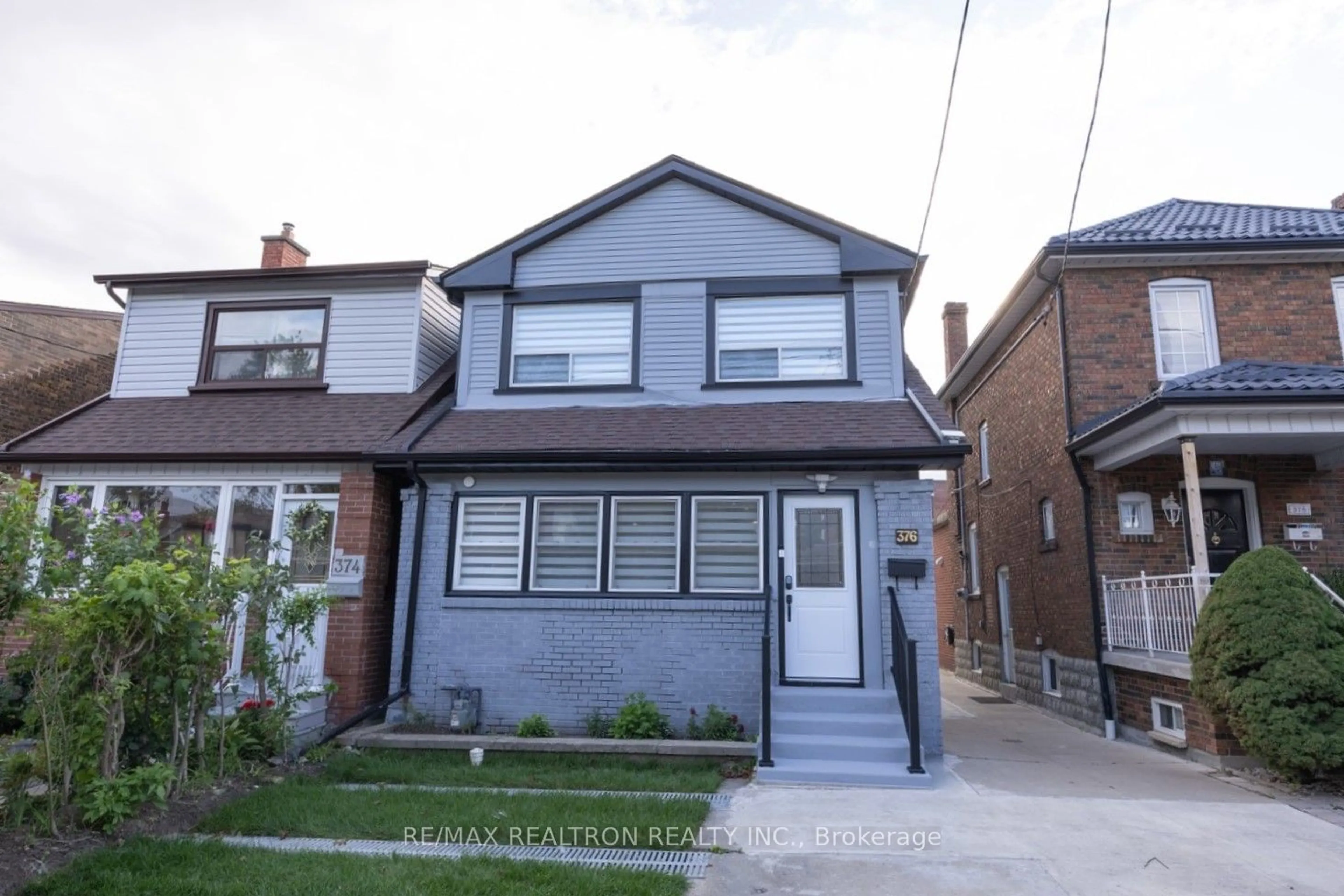 Frontside or backside of a home, the street view for 376 Northcliffe Blvd, Toronto Ontario M6E 3L1