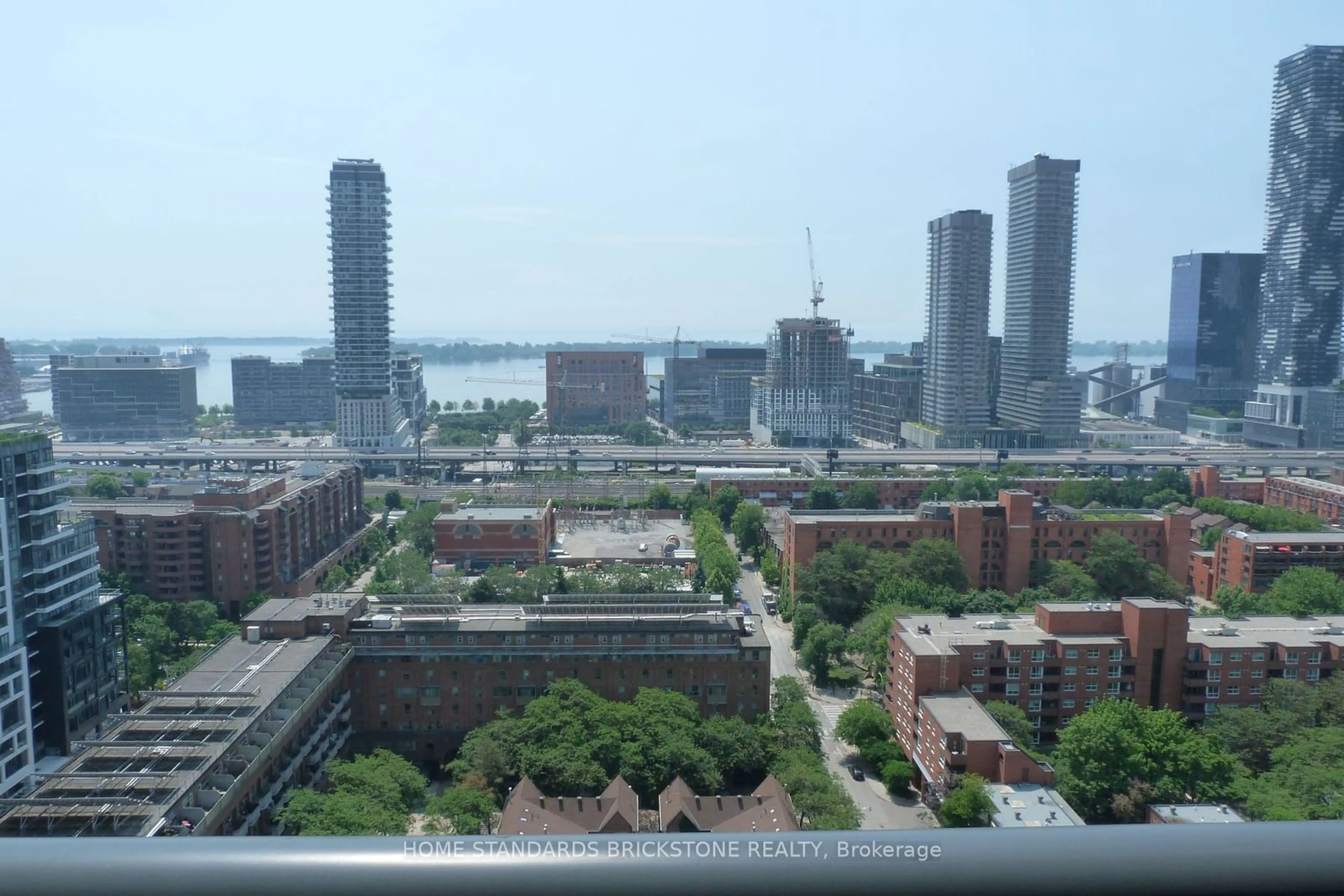 Balcony in the apartment, the view of city buildings for 158 Front St #2109, Toronto Ontario M5A 0K9