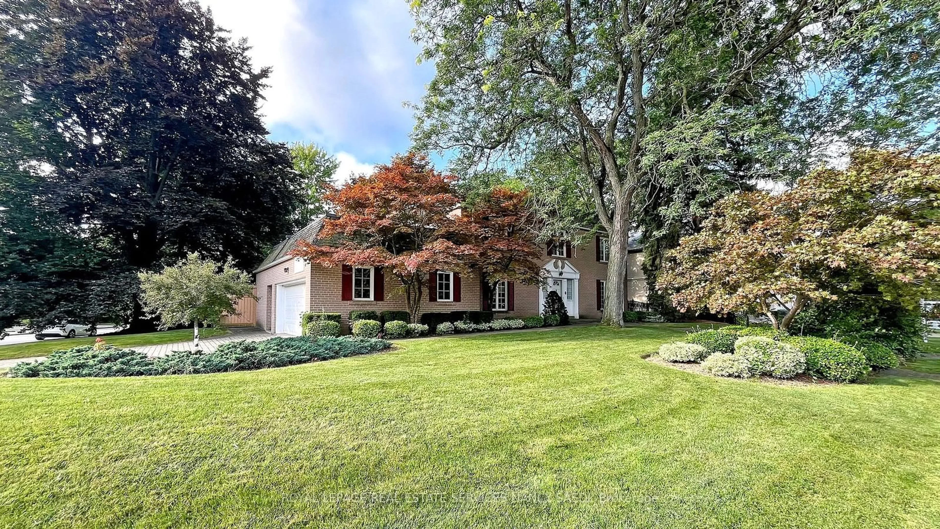 A pic from exterior of the house or condo, the fenced backyard for 31 Saintfield Ave, Toronto Ontario M3C 2M7