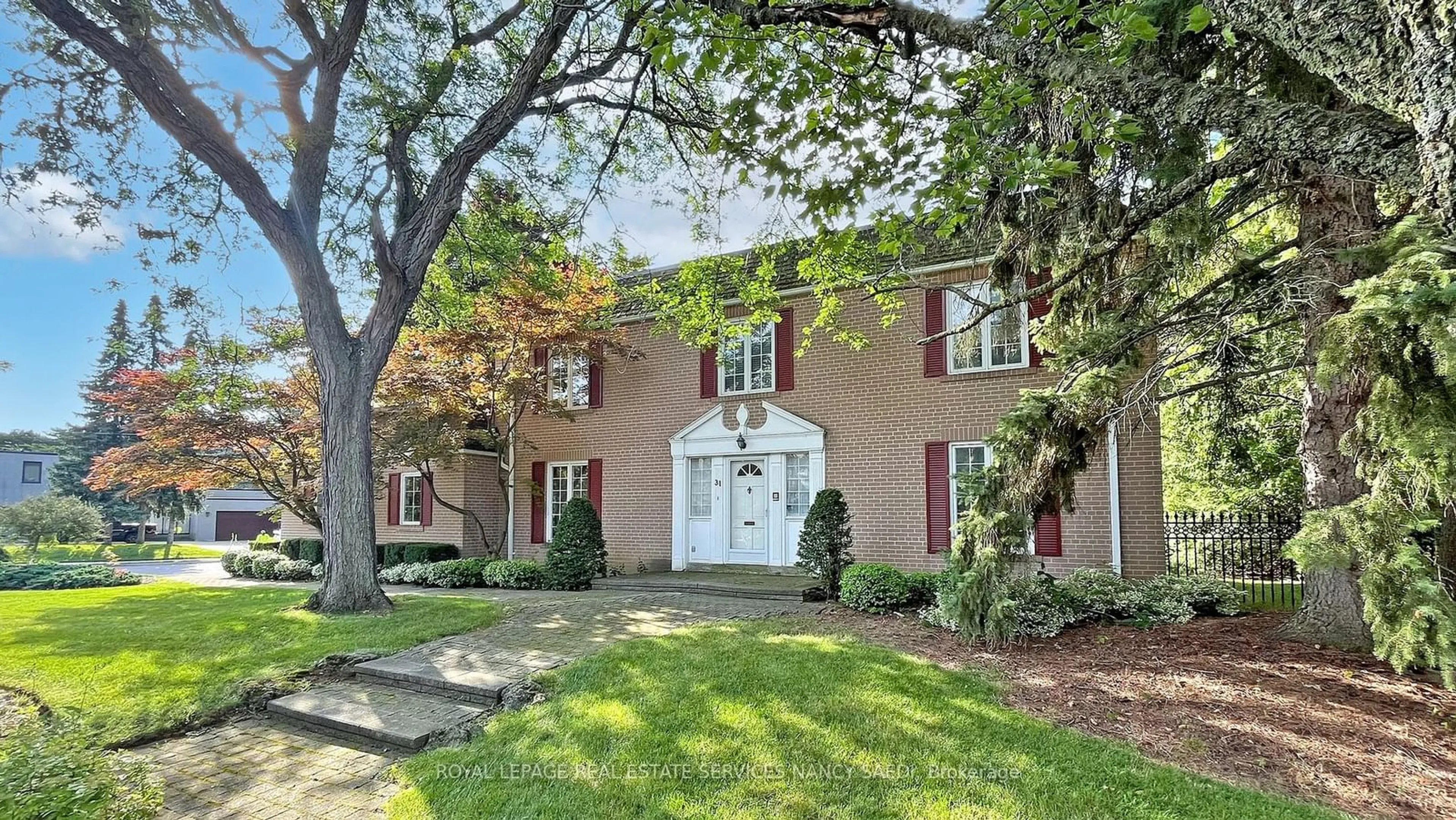 A pic from exterior of the house or condo, the street view for 31 Saintfield Ave, Toronto Ontario M3C 2M7