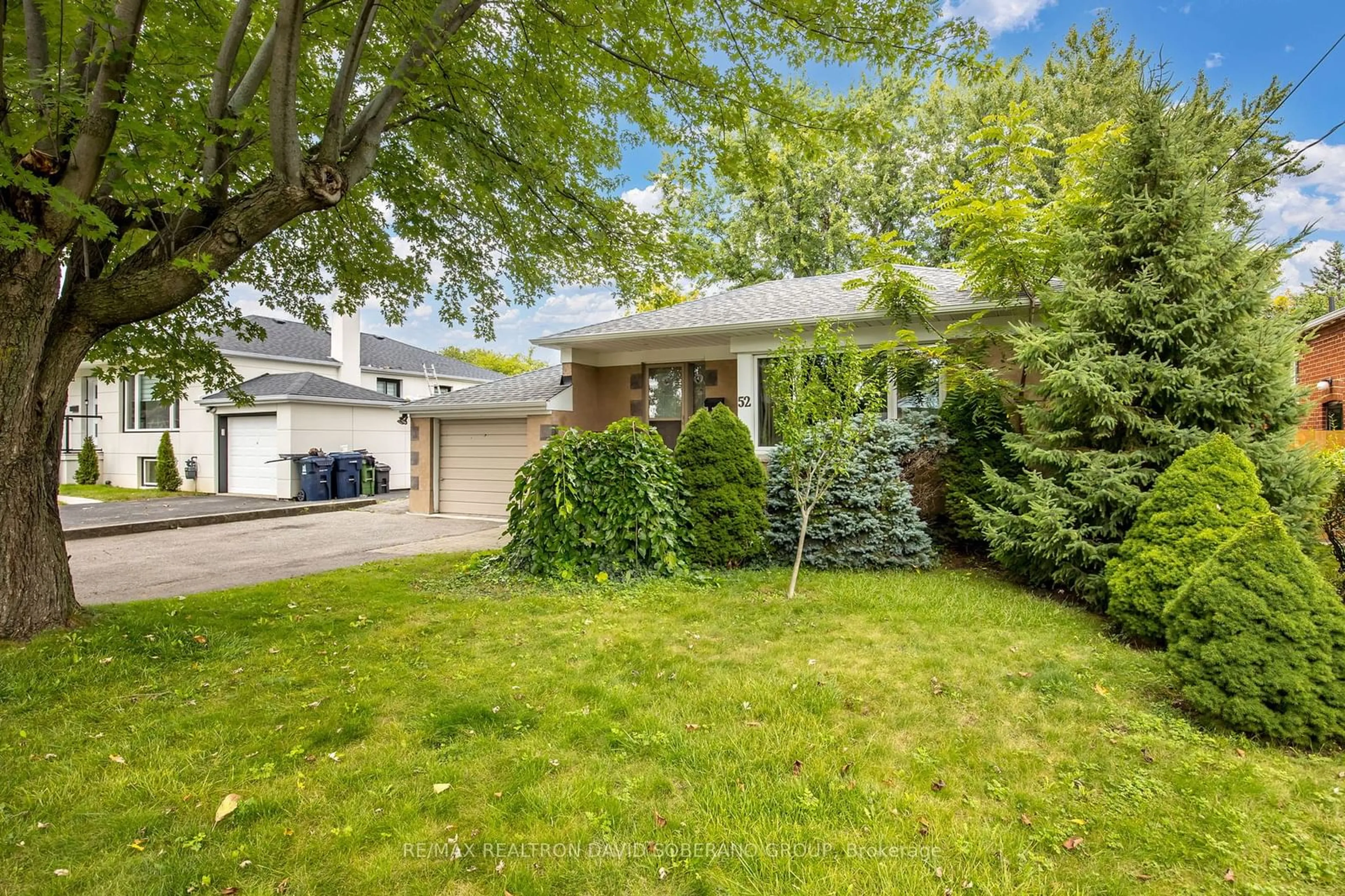 A pic from exterior of the house or condo, the fenced backyard for 52 Acton Ave, Toronto Ontario M3H 4G8