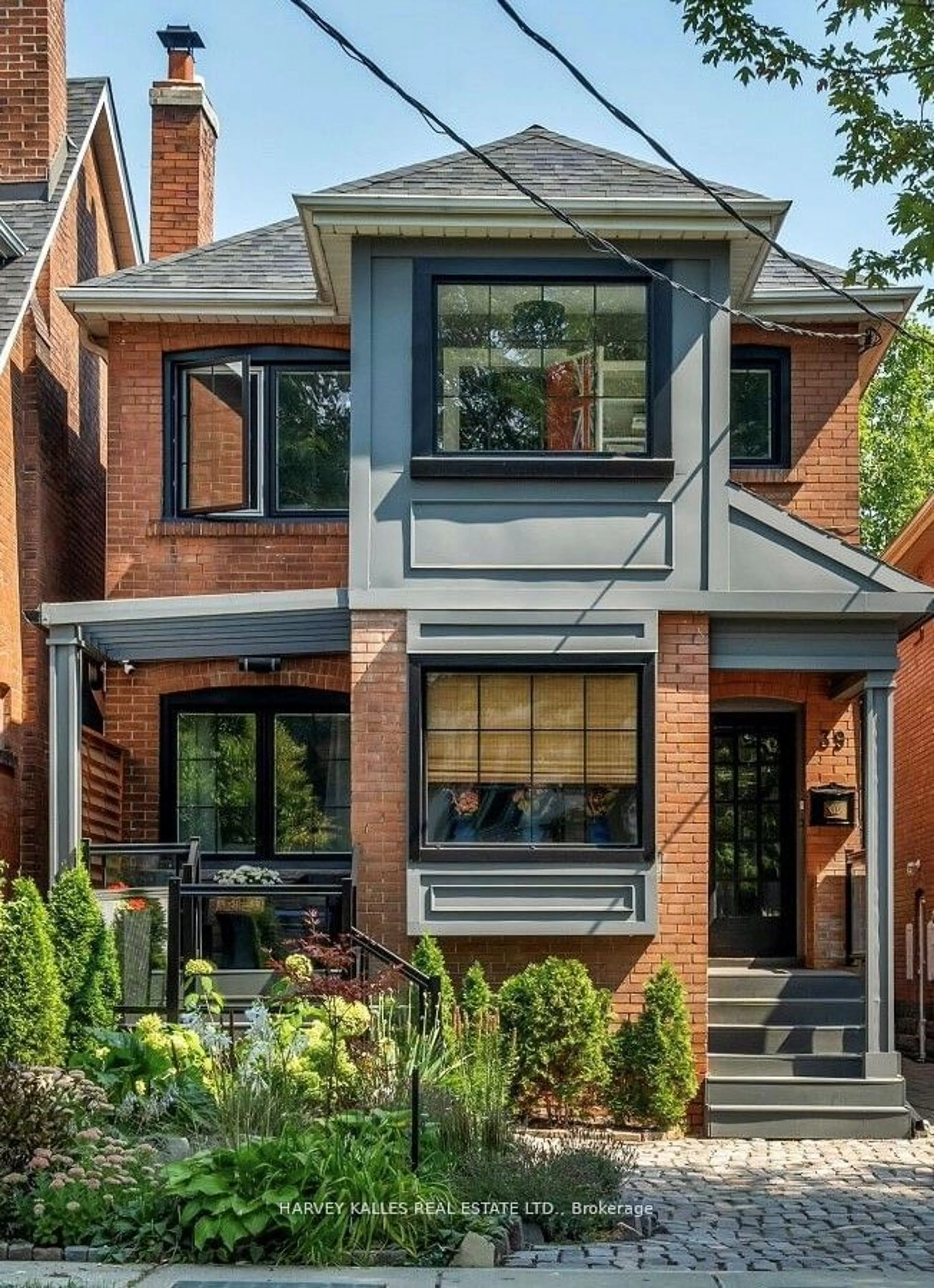 Home with brick exterior material for 39 Standish Ave, Toronto Ontario M4W 3B2