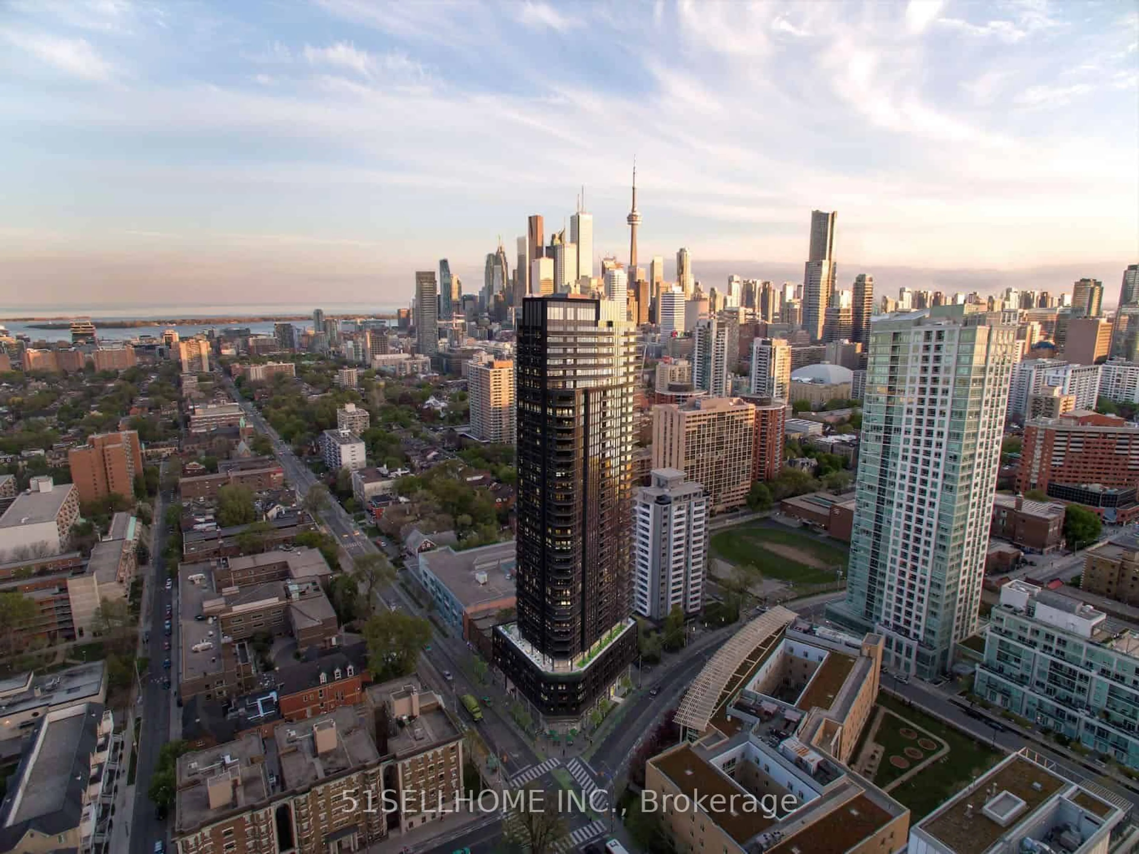 A pic from exterior of the house or condo, the view of city buildings for 159 Wellesley St #PH03, Toronto Ontario M4Y 0H5