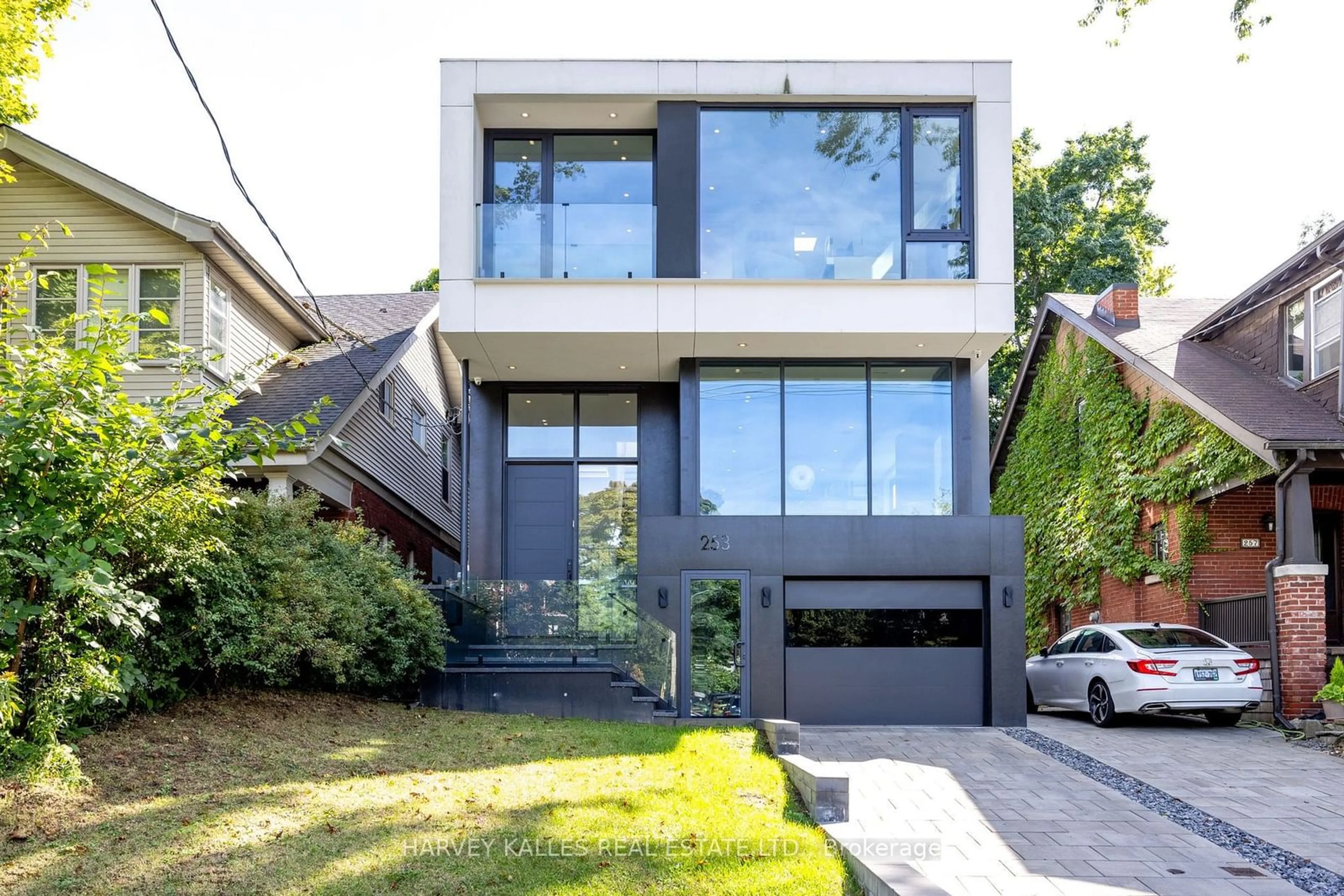 Frontside or backside of a home, the street view for 253 St Clements Ave, Toronto Ontario M4R 1H3