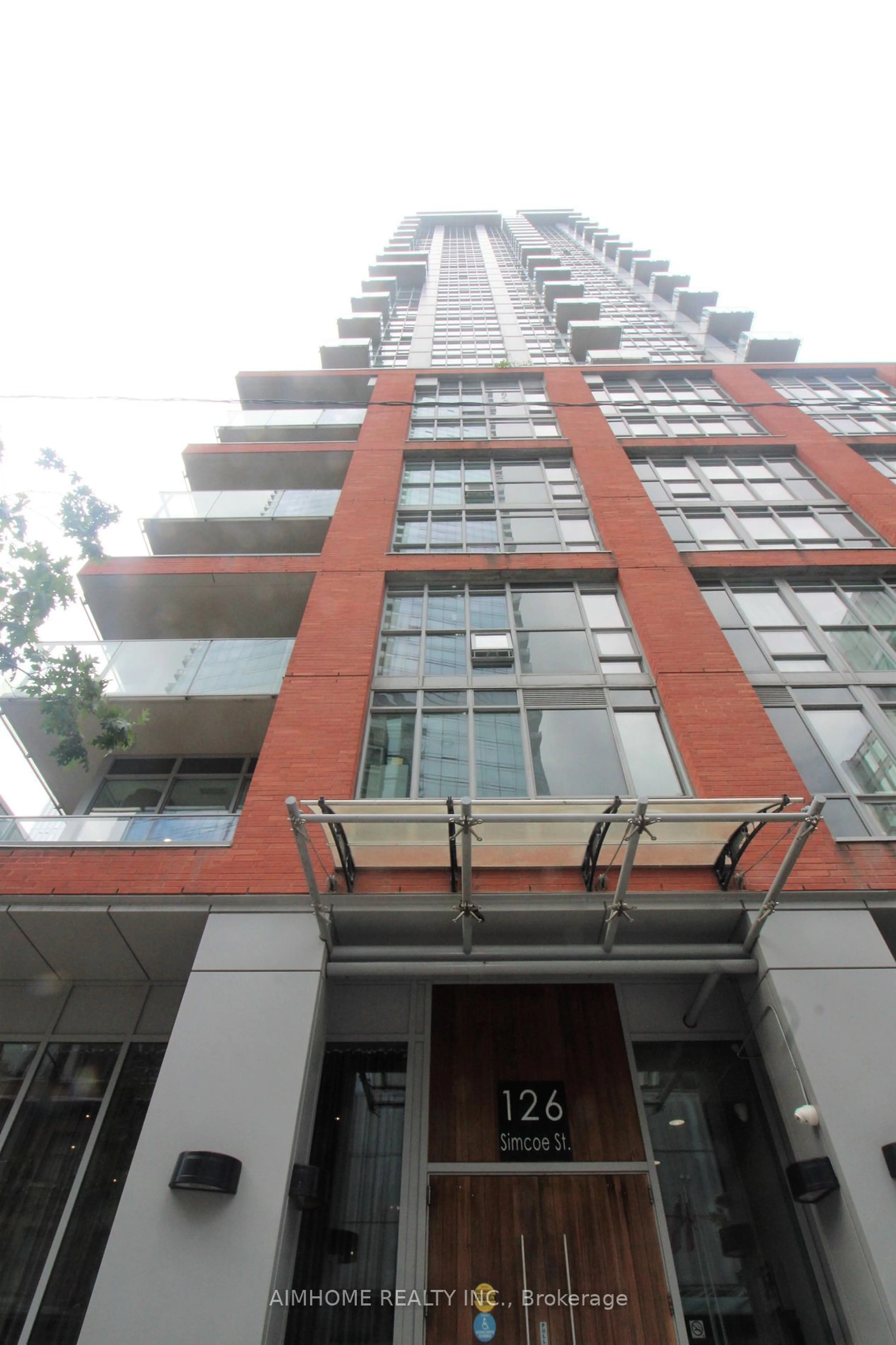 A pic from exterior of the house or condo for 126 Simcoe St #401, Toronto Ontario M5H 4E6