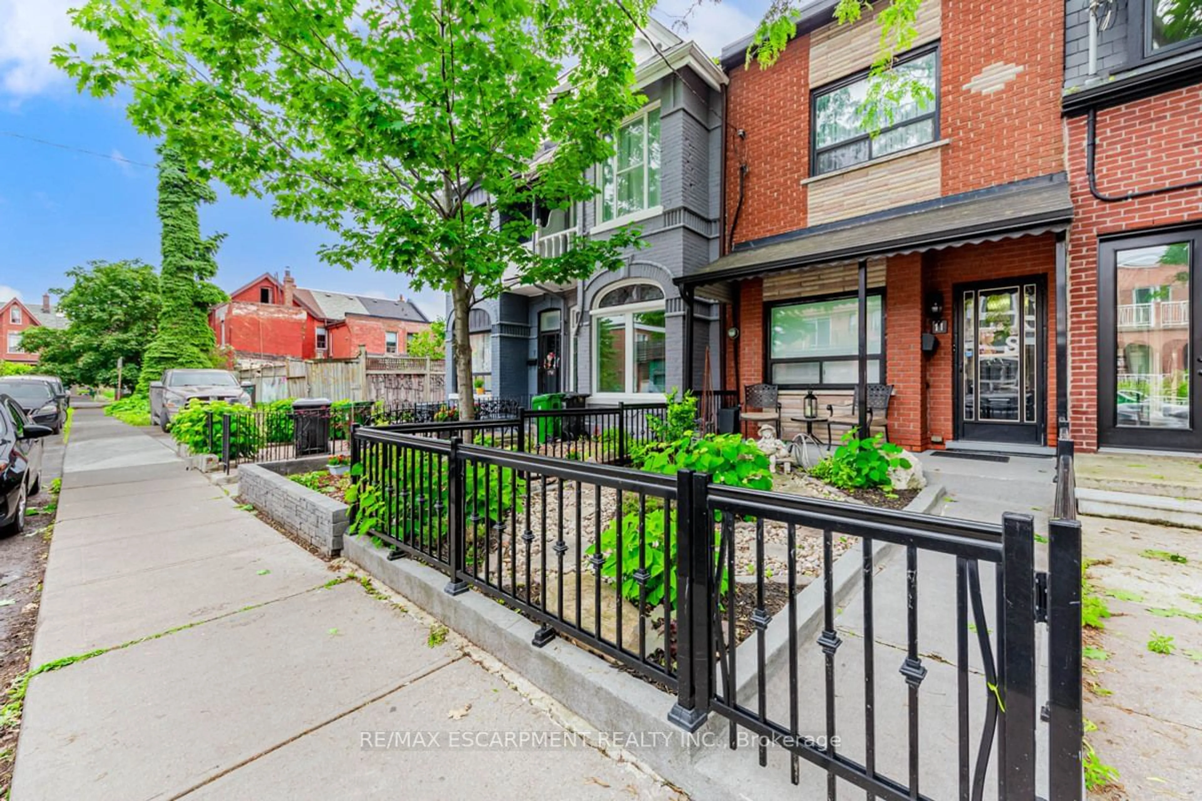 A pic from exterior of the house or condo, the street view for 11 Alma Ave, Toronto Ontario M6J 1N2