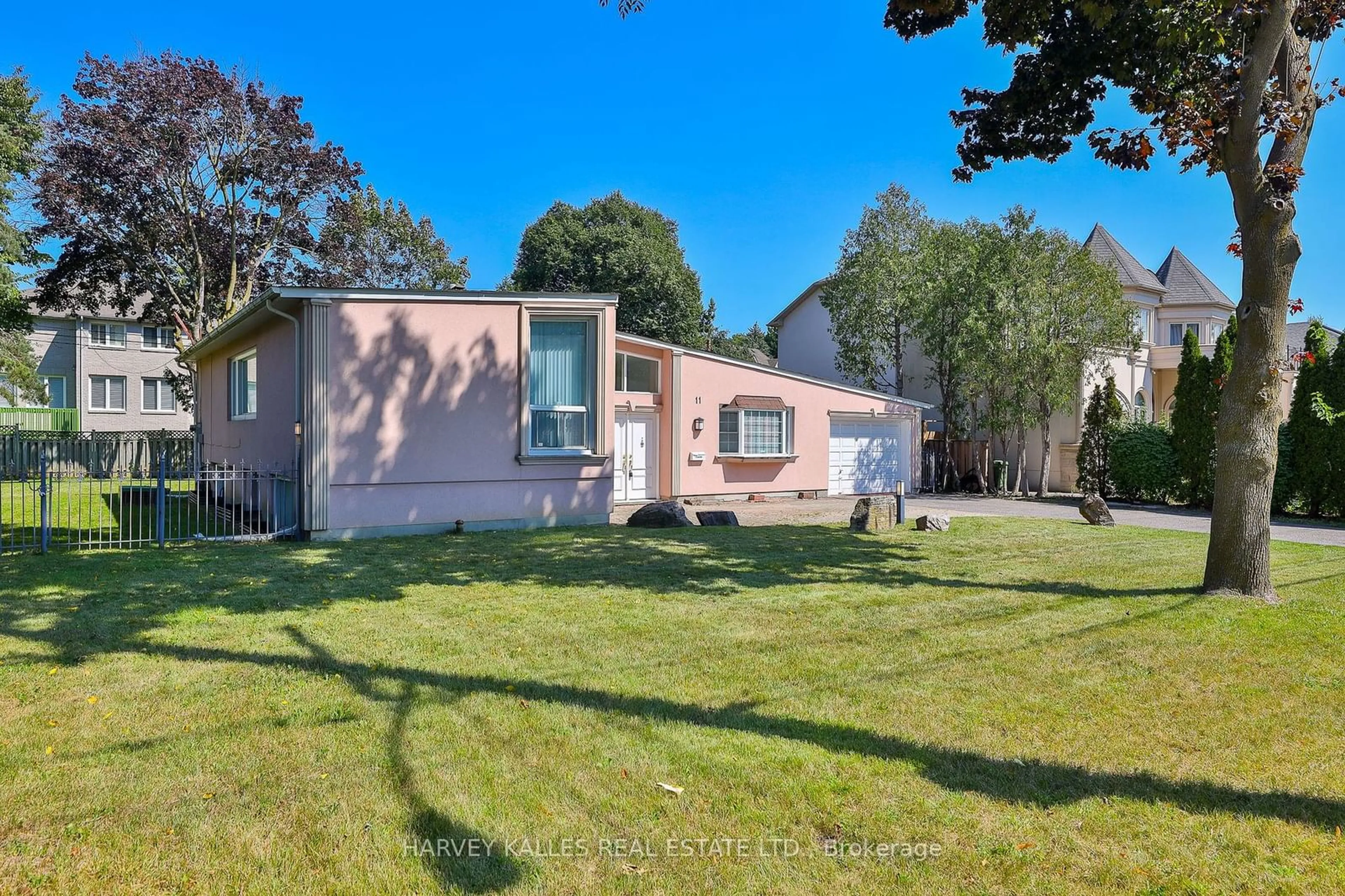 A pic from exterior of the house or condo, the fenced backyard for 11 Banbury Rd, Toronto Ontario M3B 2K3