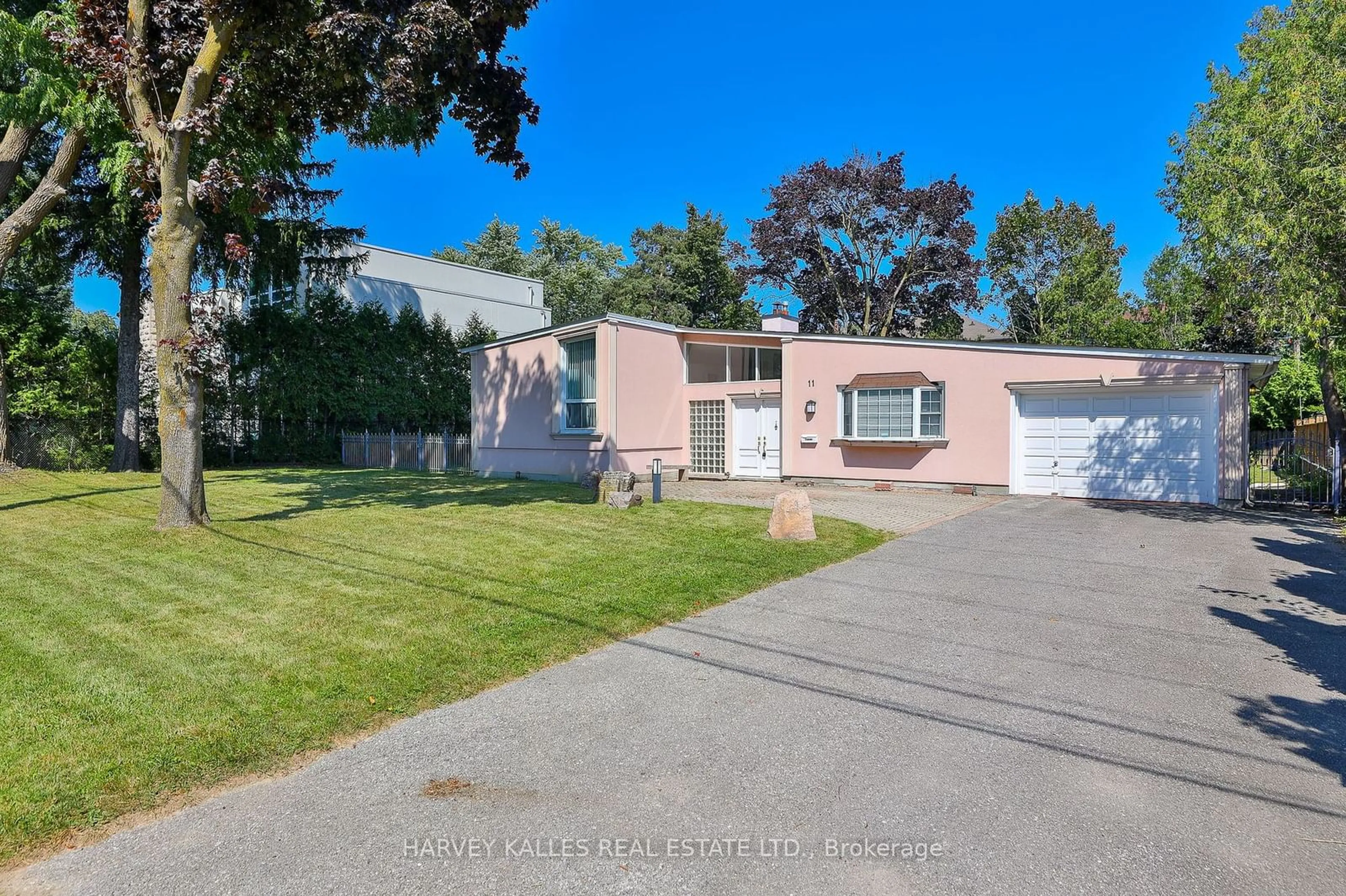 Frontside or backside of a home, the street view for 11 Banbury Rd, Toronto Ontario M3B 2K3