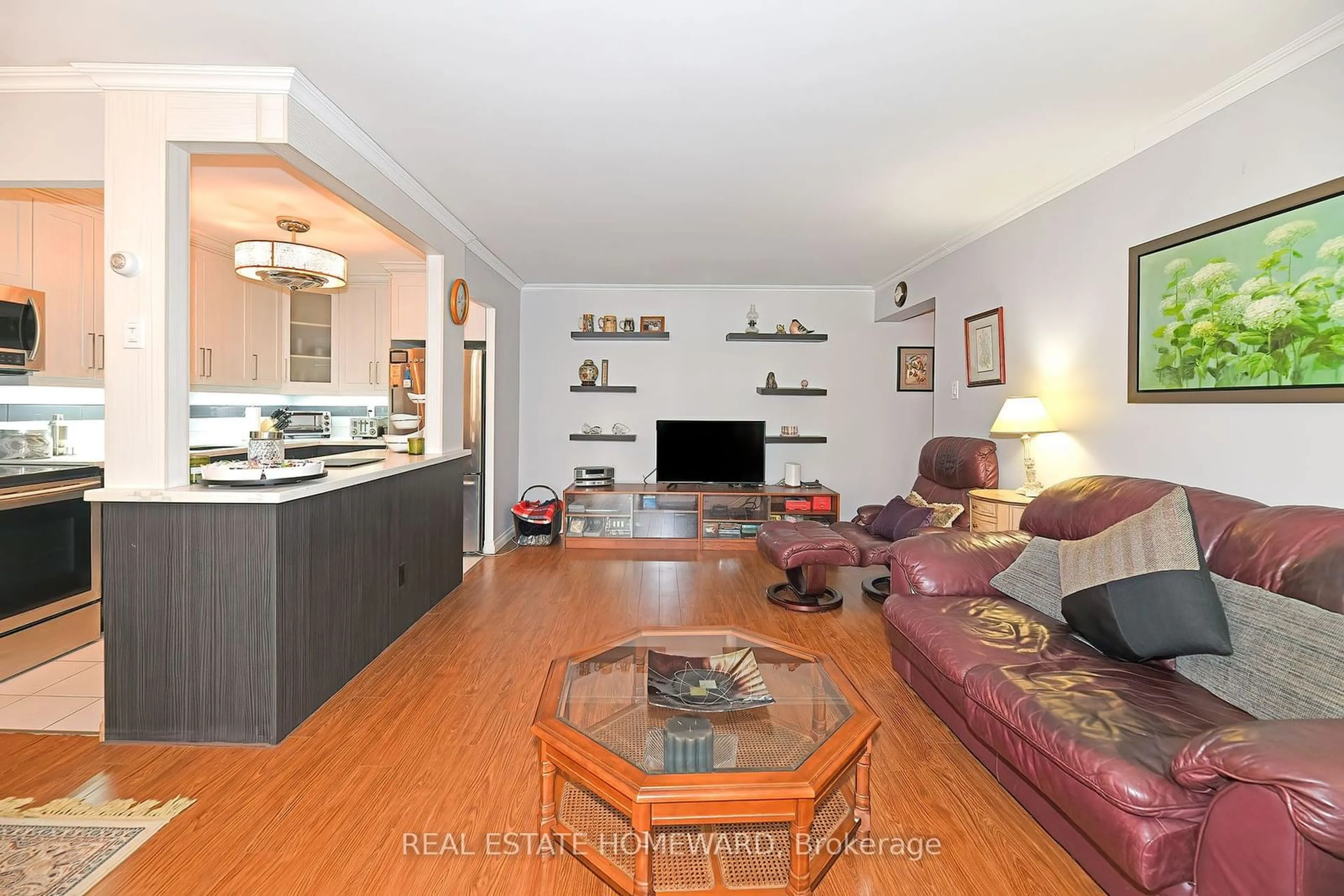 Living room, wood floors for 30 Sunrise Ave #115, Toronto Ontario M4A 2R3