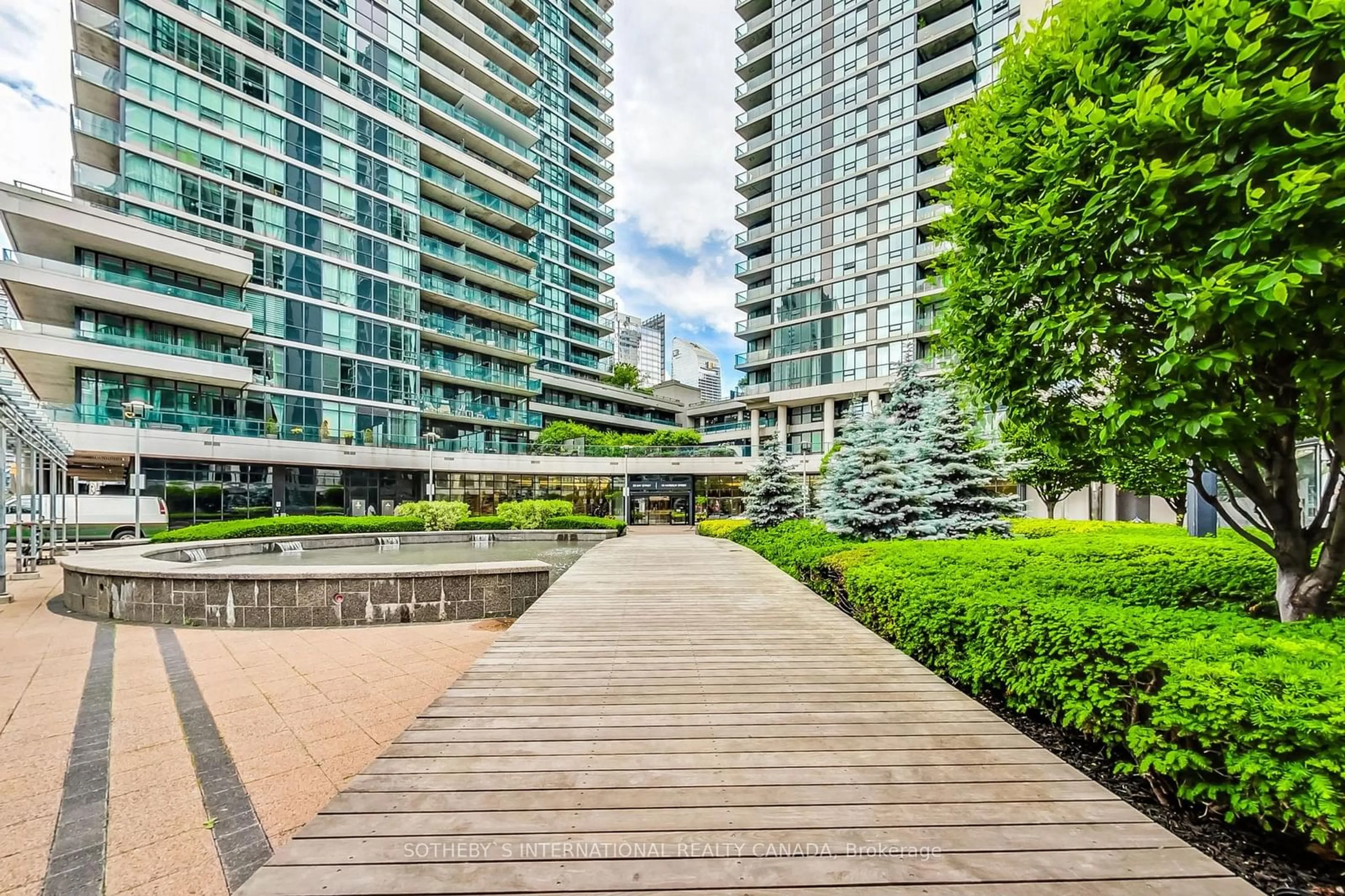 A pic from exterior of the house or condo, the view of city buildings for 18 Harbour St #1910, Toronto Ontario M5J 2Z6