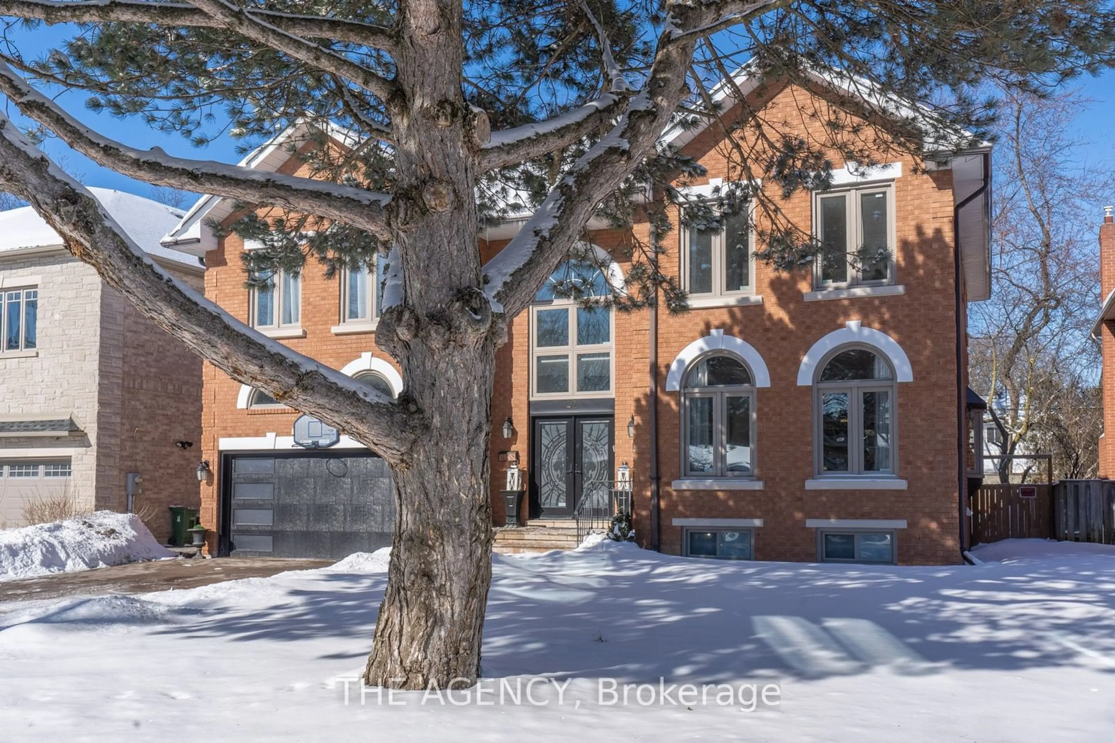 A pic from exterior of the house or condo, the street view for 42 Grangemill Cres, Toronto Ontario M3B 2J2