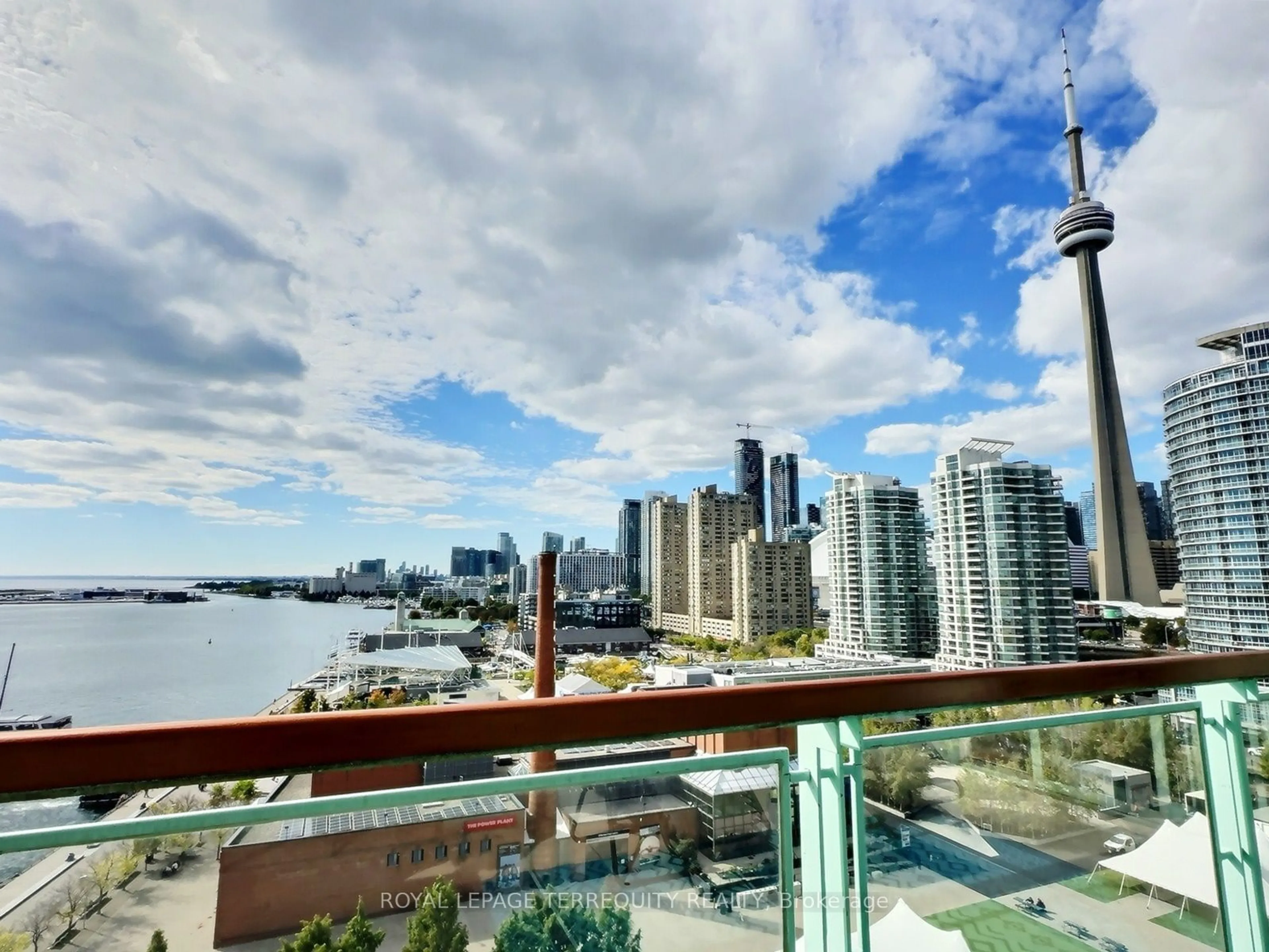 A pic from exterior of the house or condo, the view of city buildings for 211 Queens Quay #1007, Toronto Ontario M5J 2M6