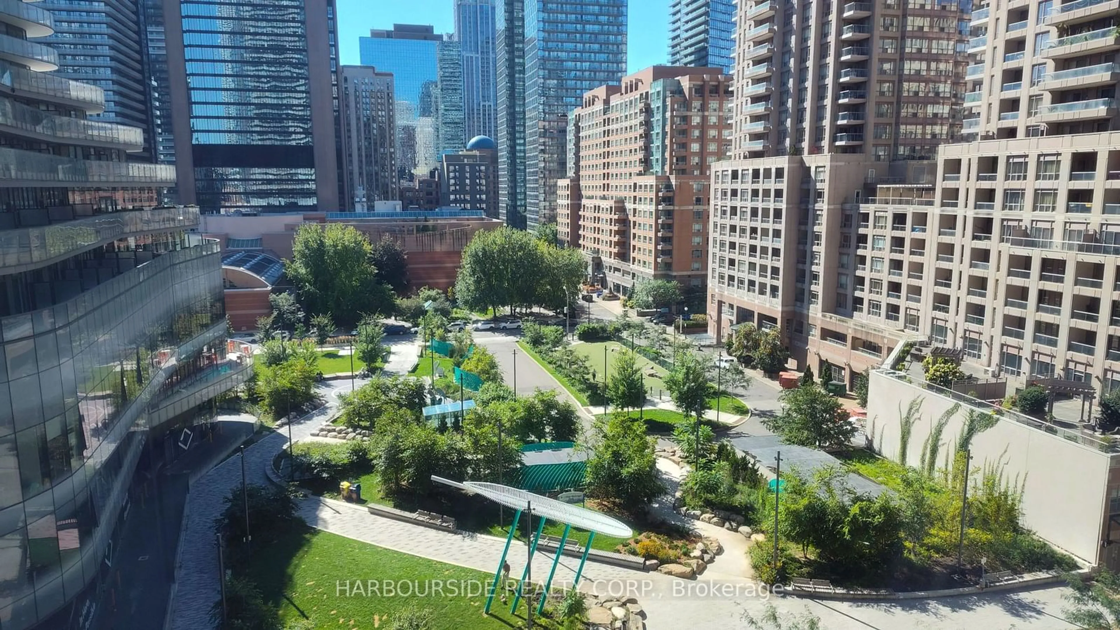 A pic from exterior of the house or condo, the view of city buildings for 24 Wellesley St #914, Toronto Ontario M4Y 2X6