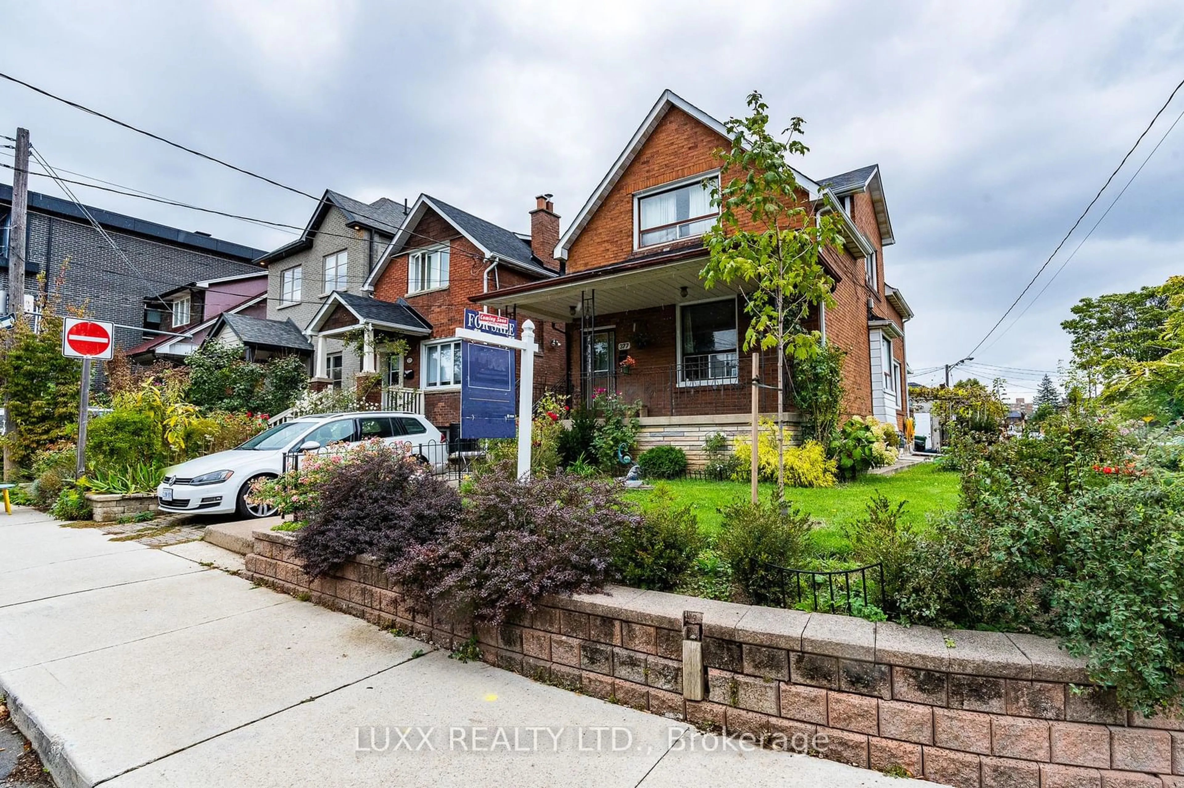 Frontside or backside of a home, the street view for 377 Glenholme Ave, Toronto Ontario M6E 3E6