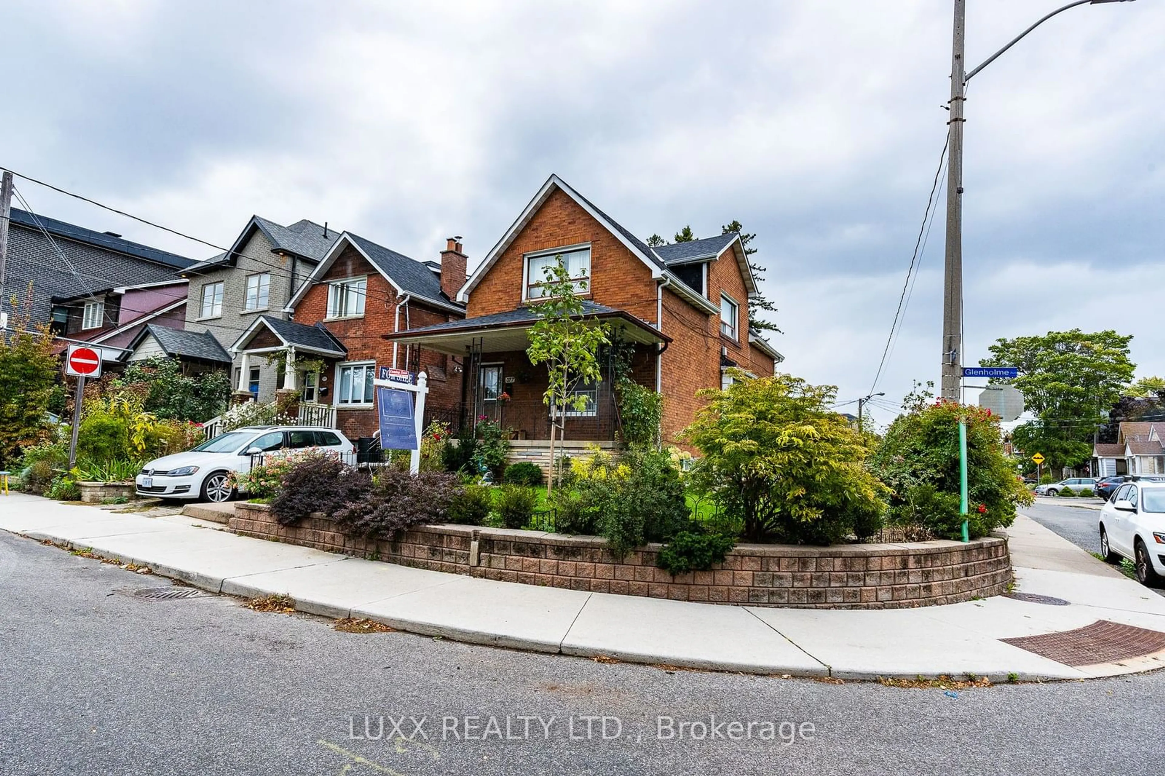 Frontside or backside of a home, the street view for 377 Glenholme Ave, Toronto Ontario M6E 3E6