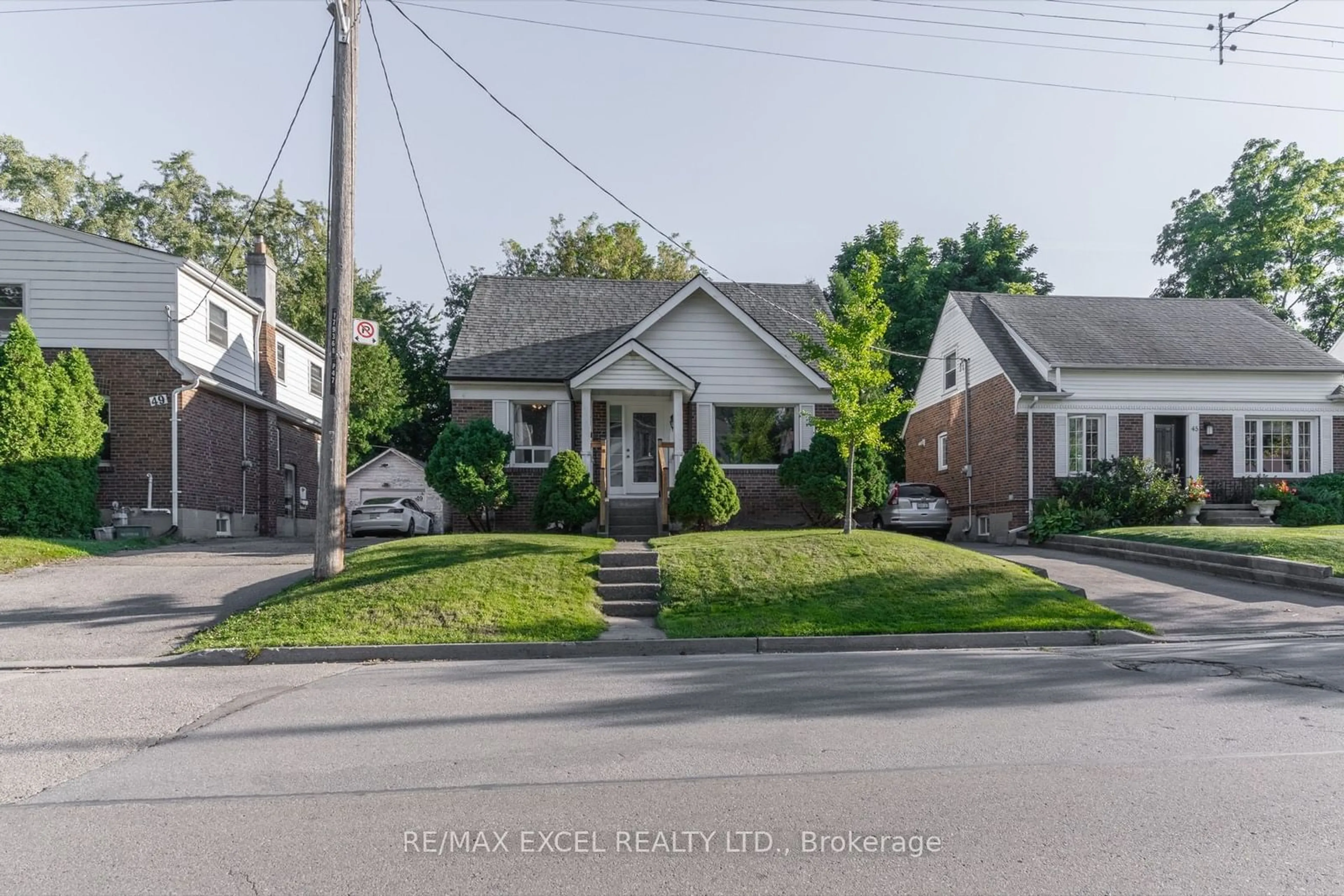 Frontside or backside of a home, the street view for 47 Anndale Dr, Toronto Ontario M2N 2W9