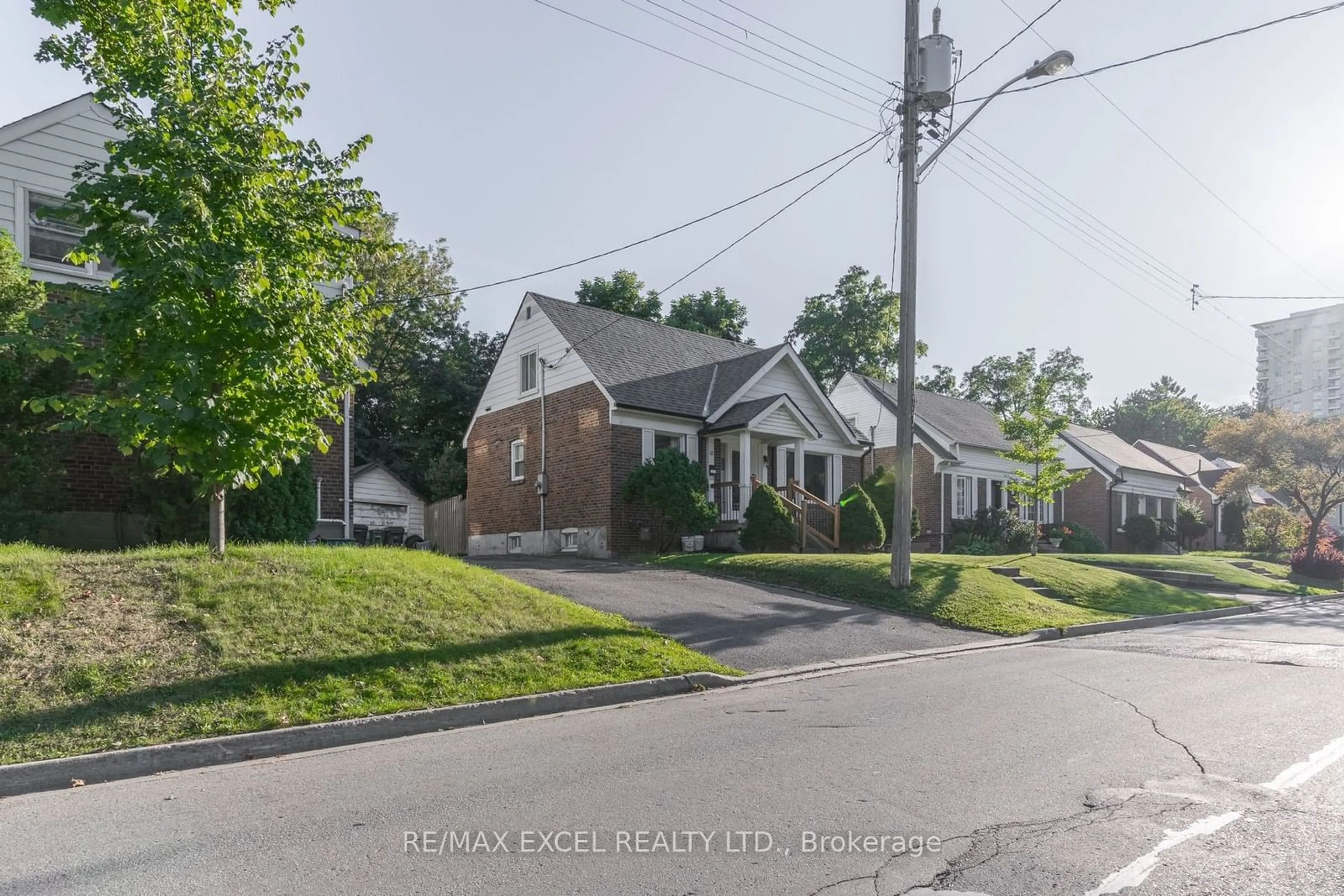 Frontside or backside of a home, the street view for 47 Anndale Dr, Toronto Ontario M2N 2W9