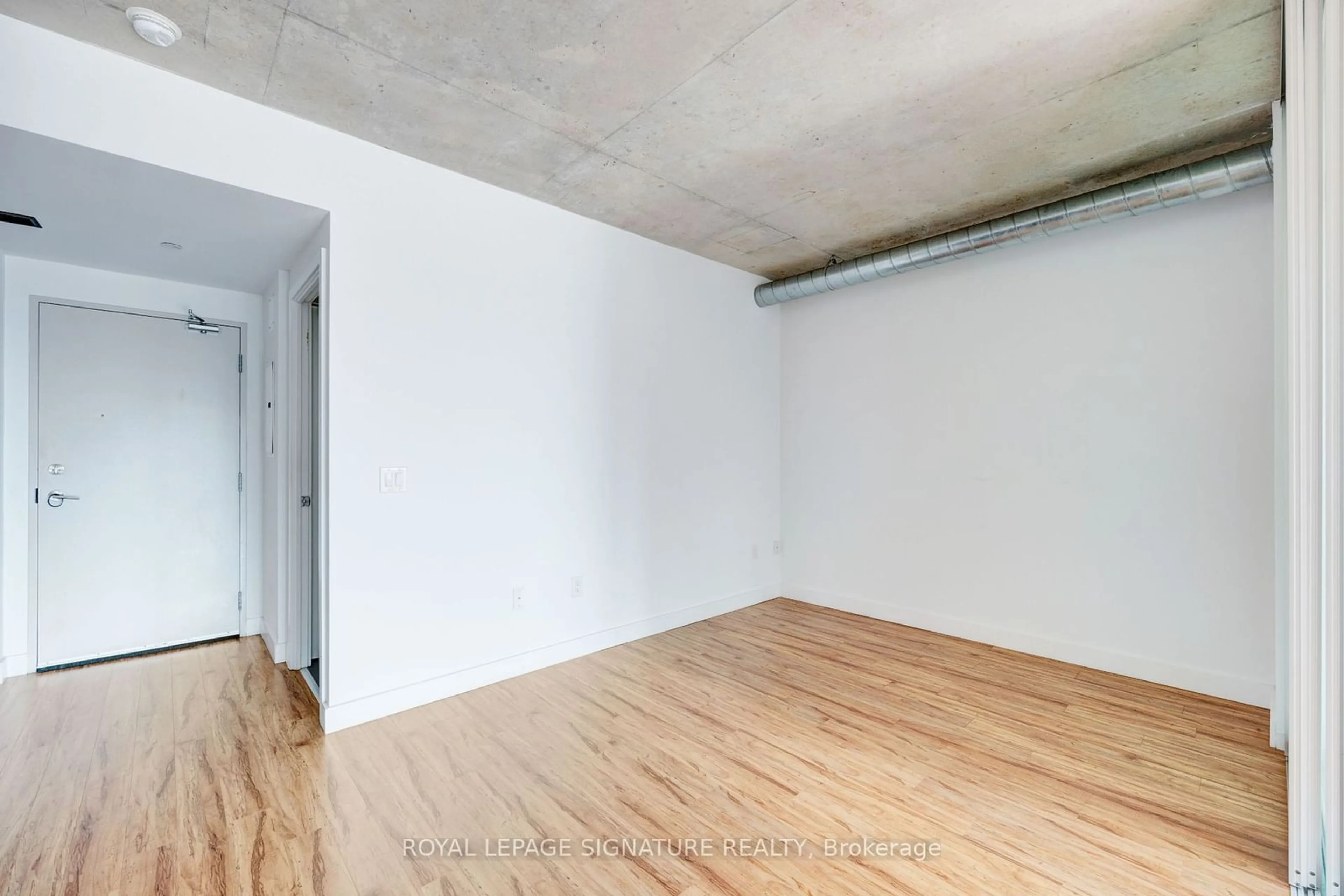 A pic of a room, cement floor for 32 Trolley Cres #507, Toronto Ontario M5A 0E8