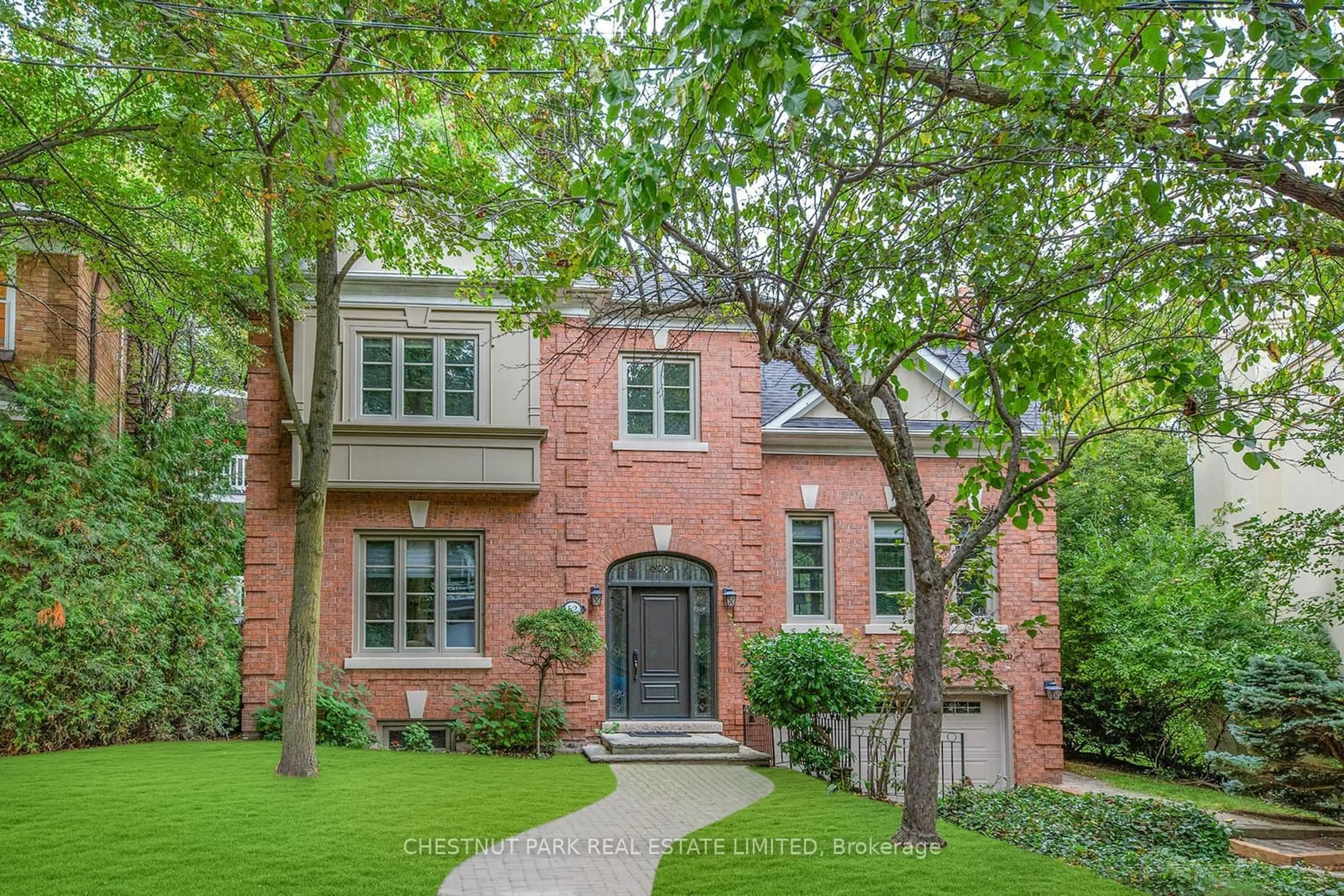 Home with brick exterior material for 52 Strathgowan Ave, Toronto Ontario M4N 1B9