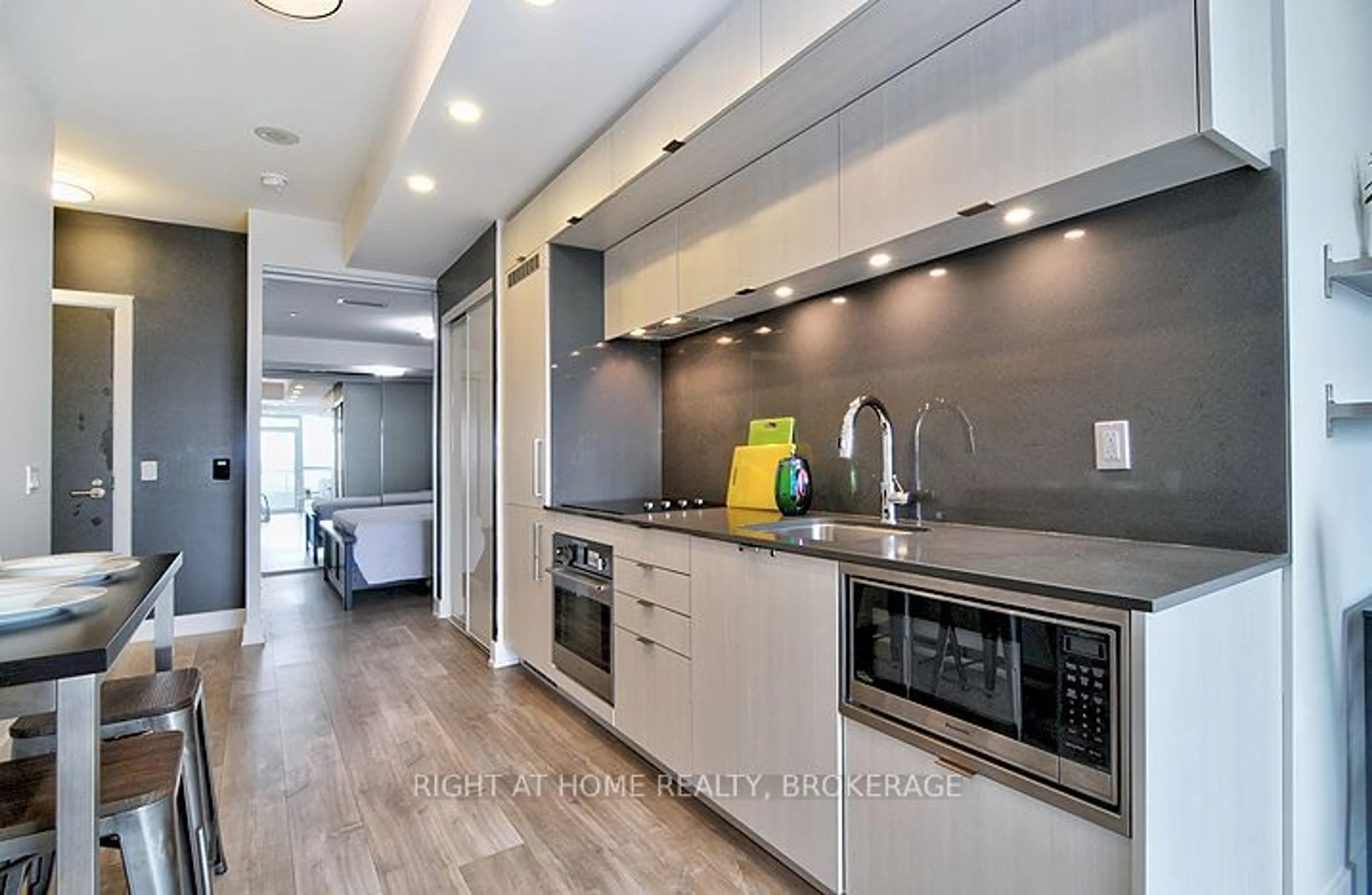 Contemporary kitchen, wood floors for 38 Cameron St #1128, Toronto Ontario M5T 0C3