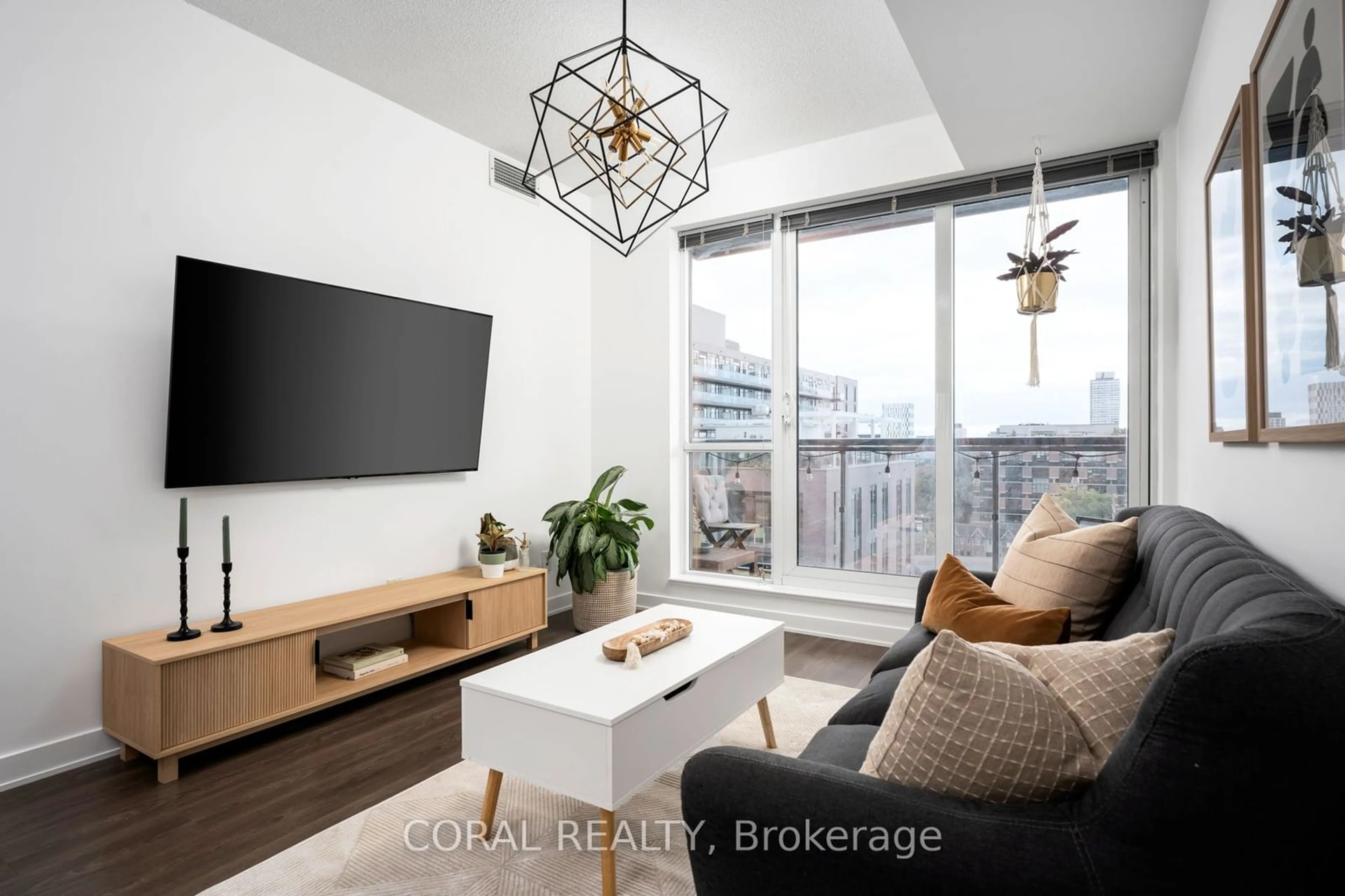 Living room, wood floors for 55 Regent Park Blvd #903, Toronto Ontario M5A 0C2