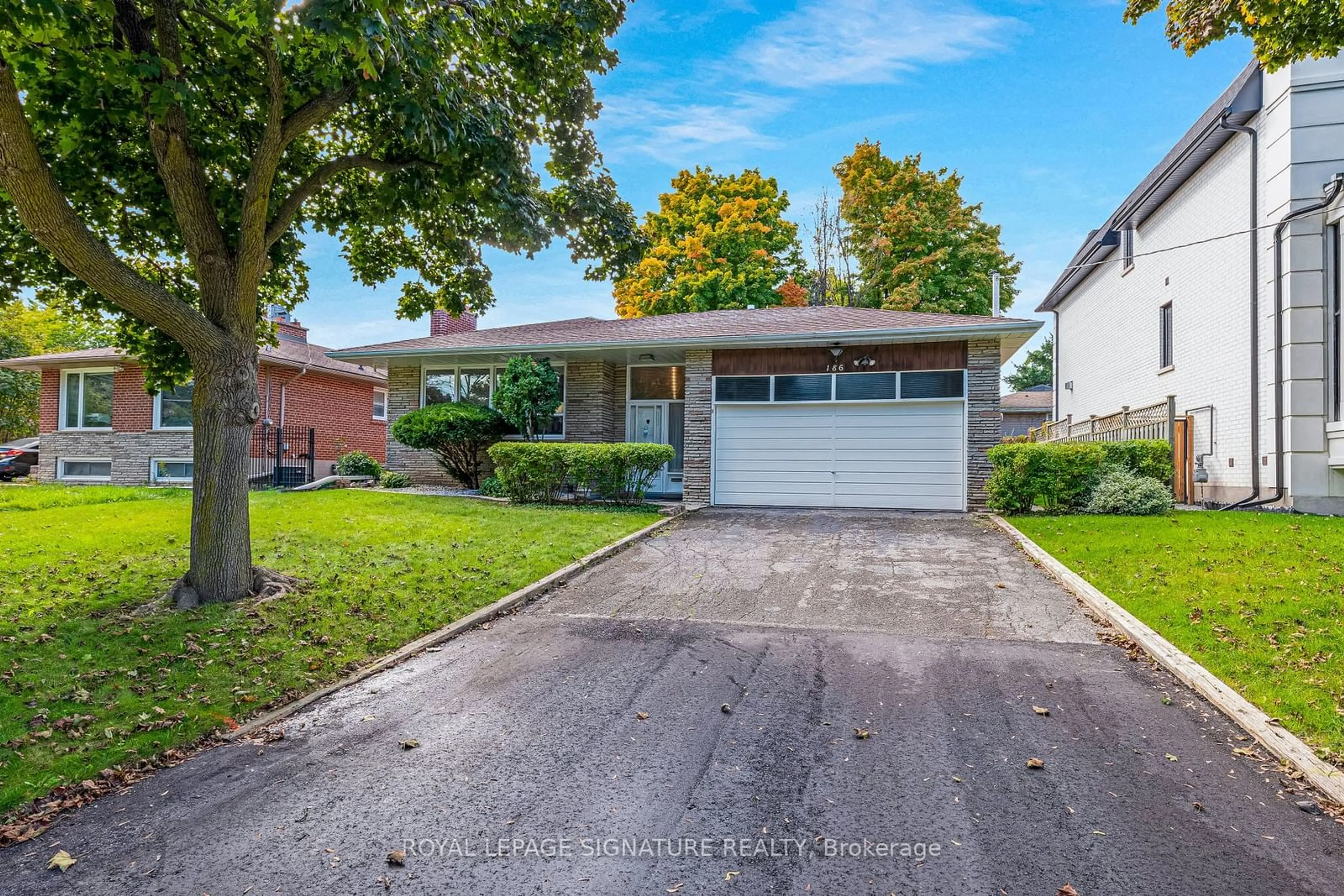 Frontside or backside of a home, the street view for 186 Burbank Dr, Toronto Ontario M2K 1P4