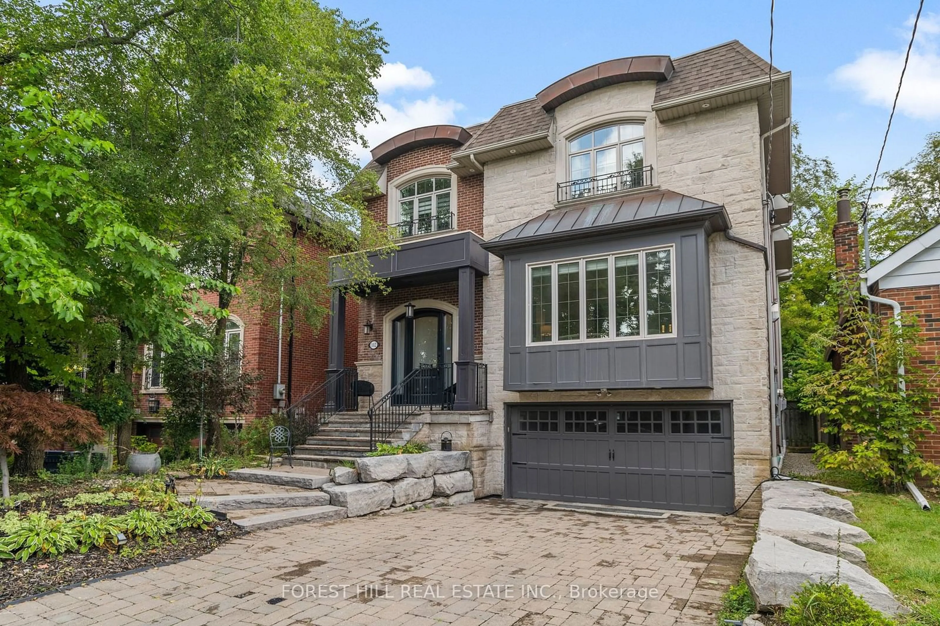 Home with brick exterior material for 102 Carmichael Ave, Toronto Ontario M5M 2W9