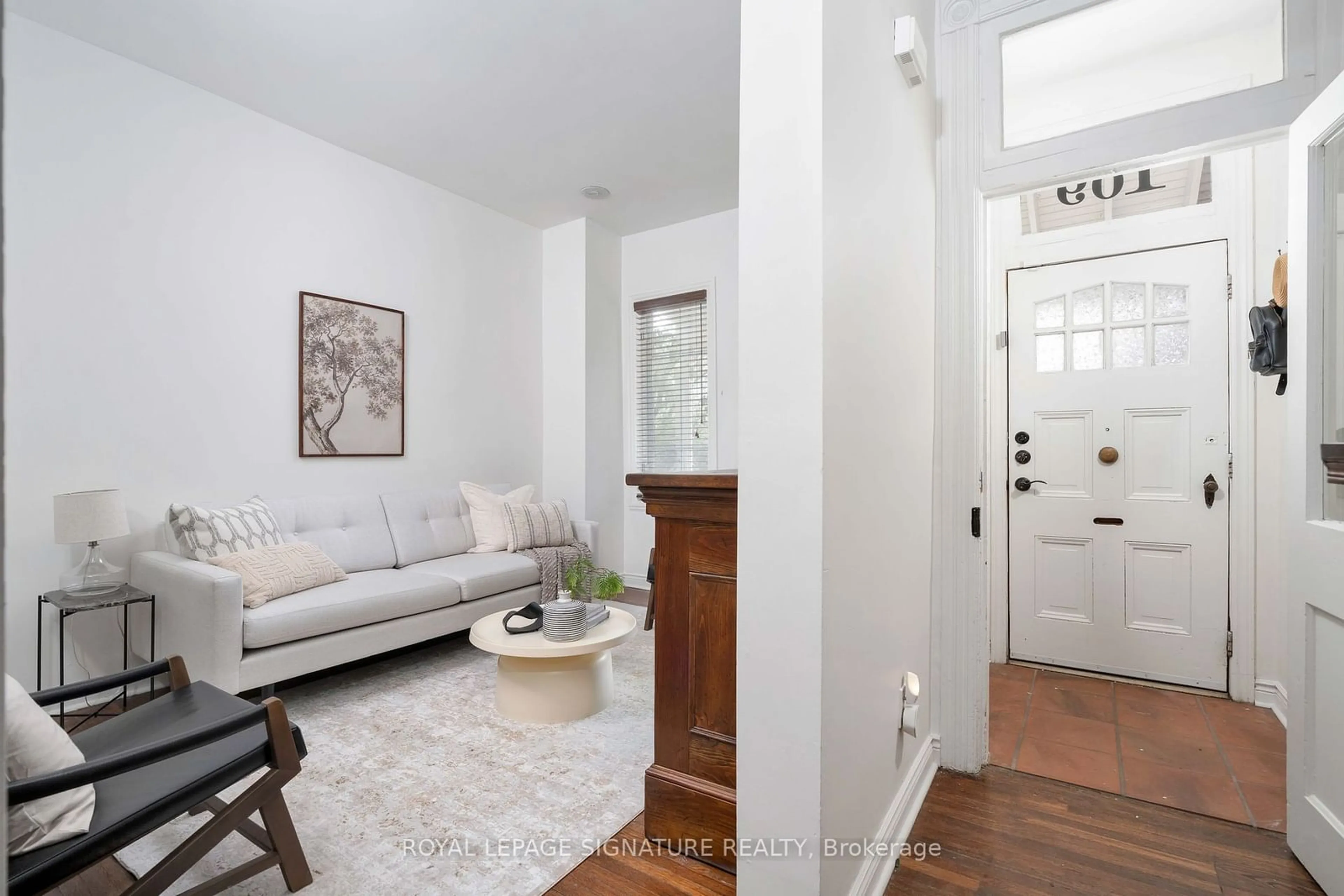 Indoor entryway, wood floors for 109 Manning Ave, Toronto Ontario M6J 2K6