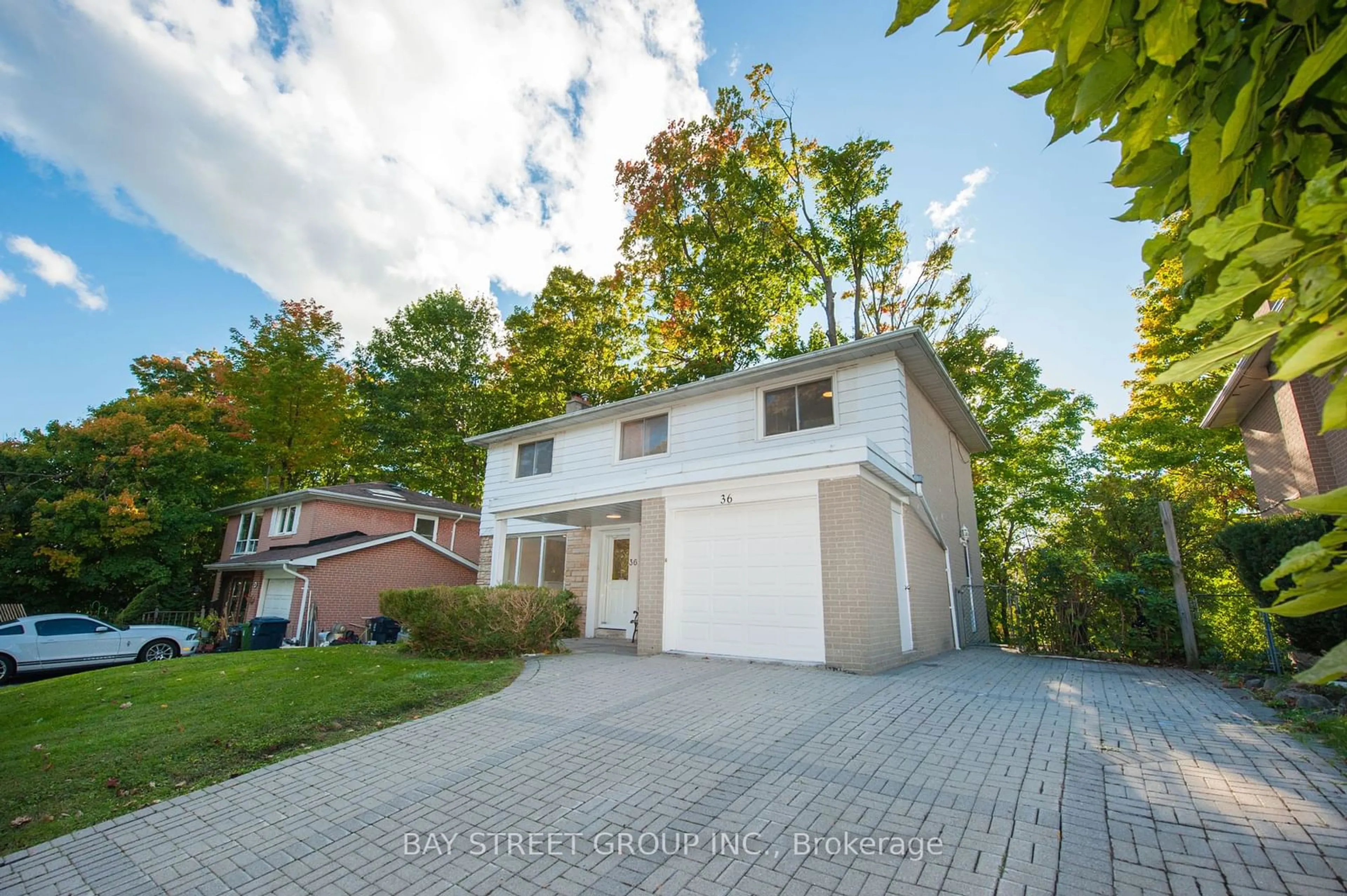 Frontside or backside of a home, the street view for 36 Brahms Ave, Toronto Ontario M2H 1H4