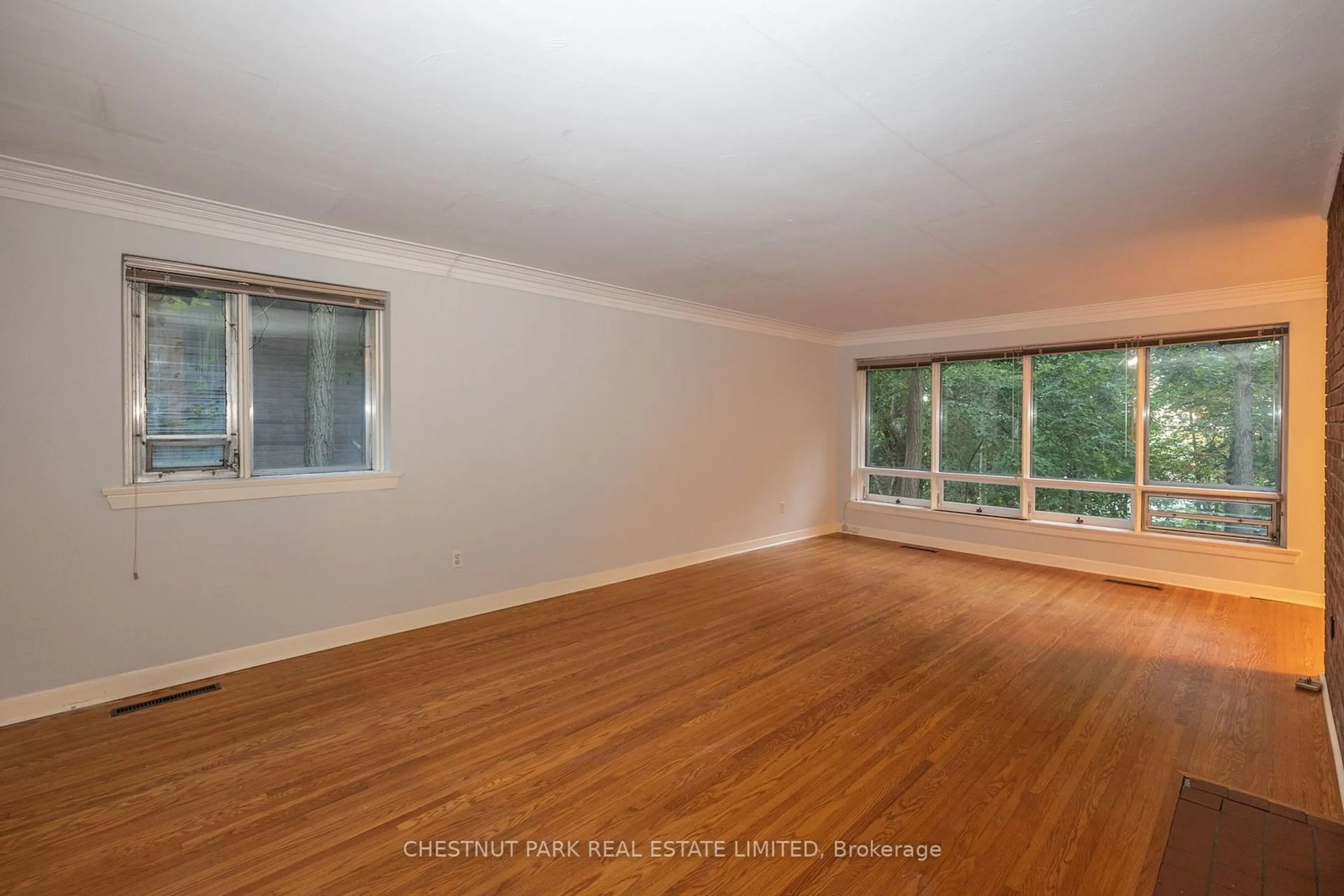 A pic of a room, wood floors for 6C Wychwood Park, Toronto Ontario M6G 2V5