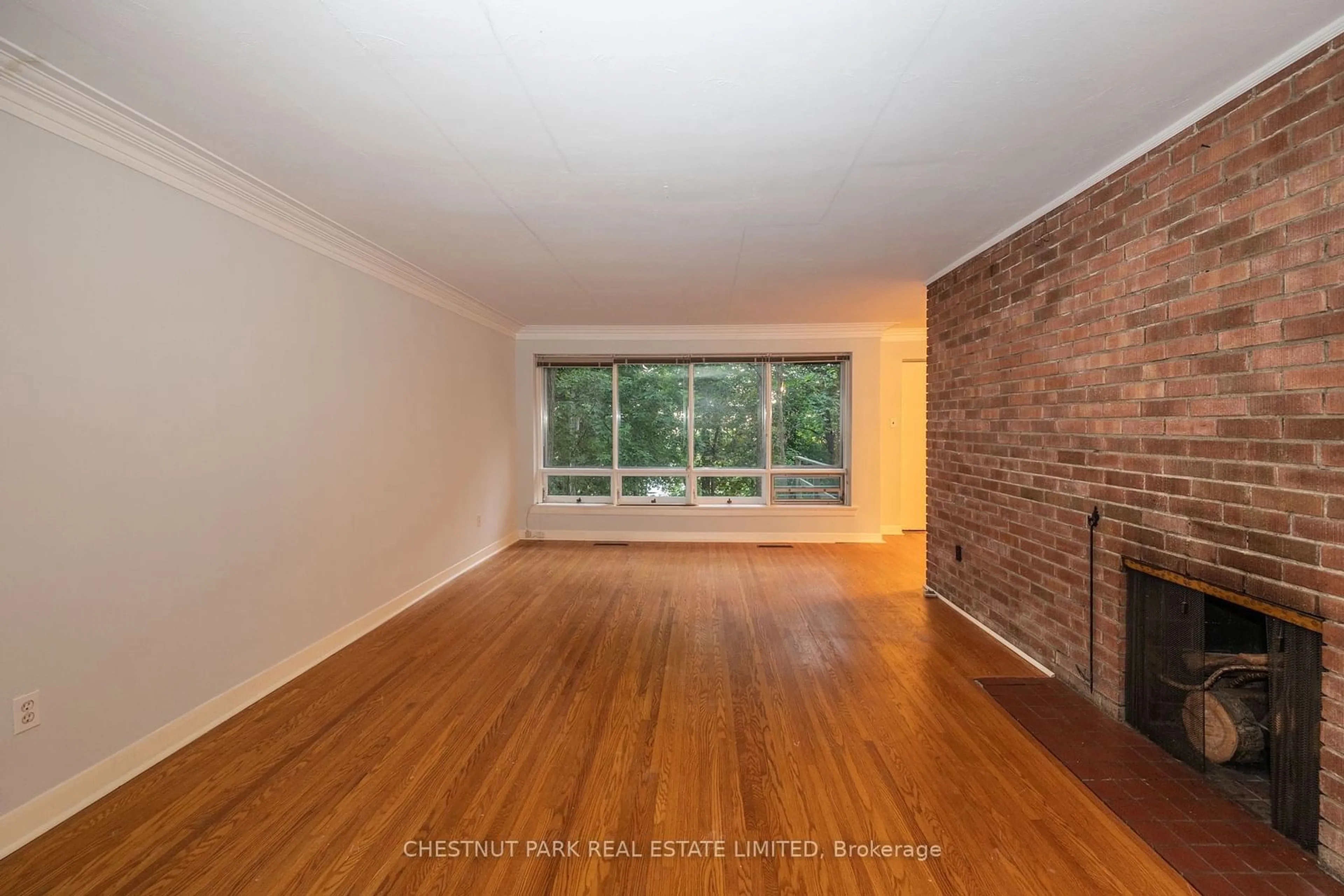 A pic of a room, wood floors for 6C Wychwood Park, Toronto Ontario M6G 2V5