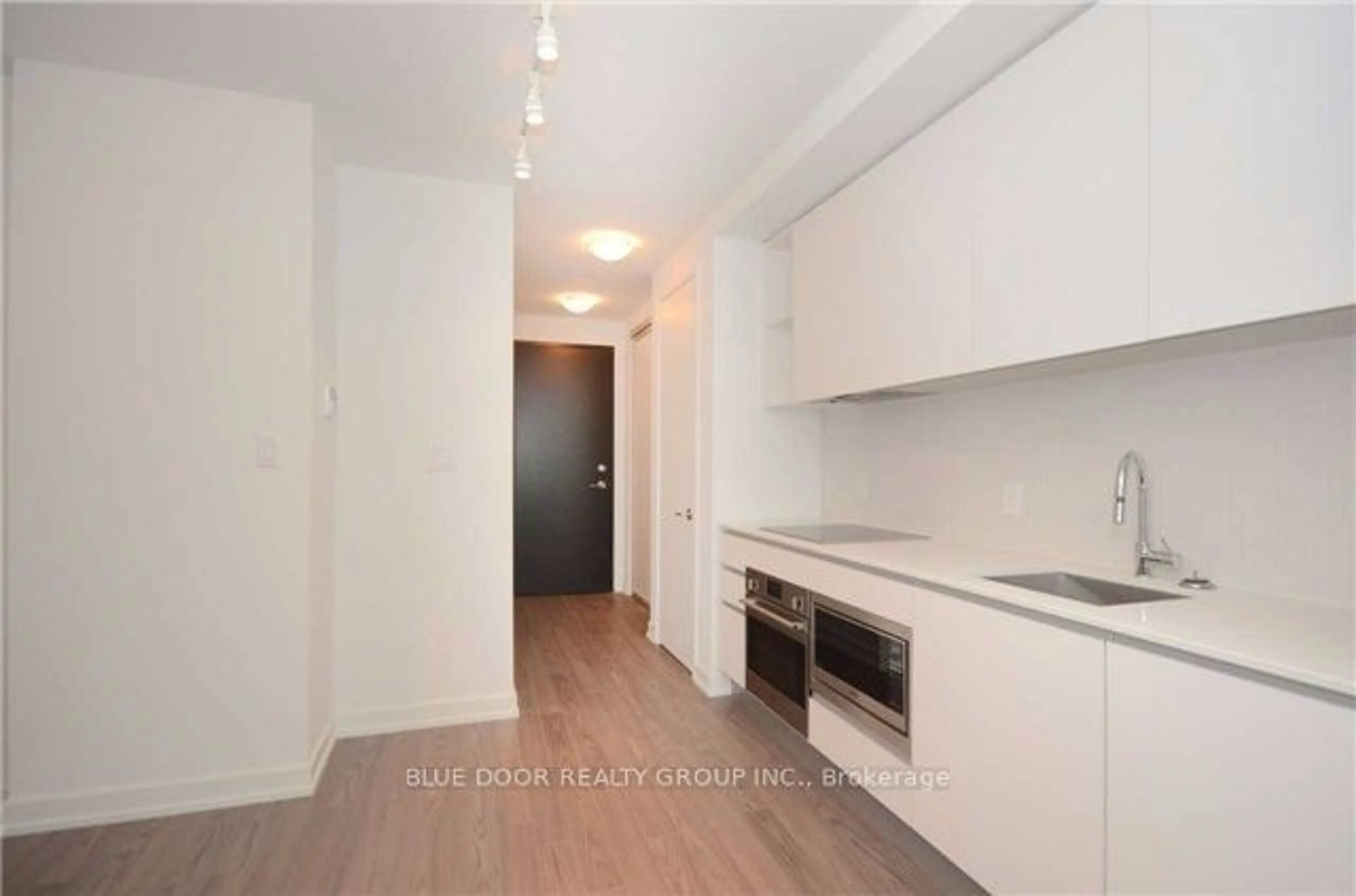 Standard kitchen, wood floors for 377 Madison Ave #218, Toronto Ontario M4V 2W7