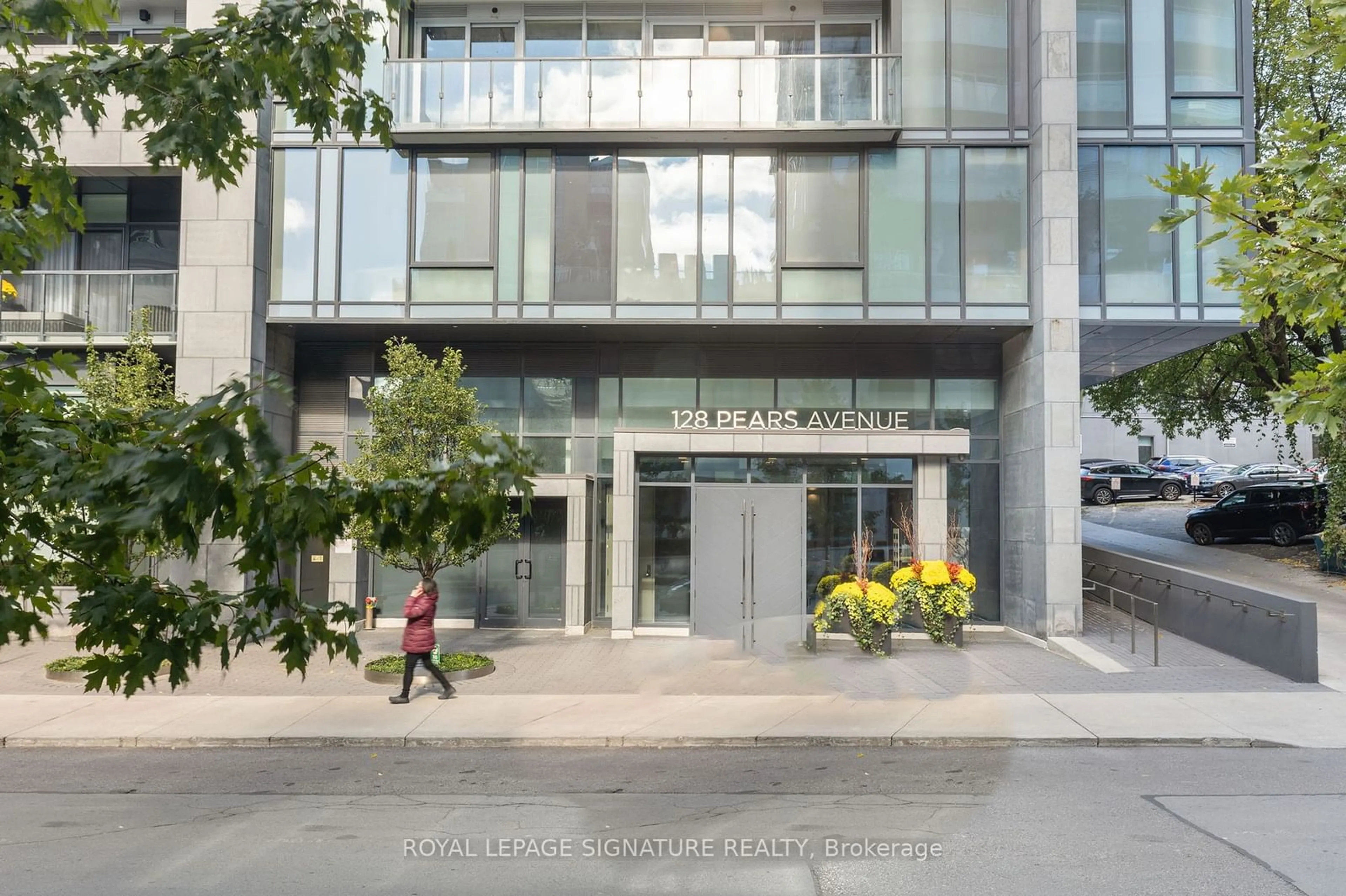 A pic from exterior of the house or condo, the street view for 128 Pears Ave #409, Toronto Ontario M5R 0A9