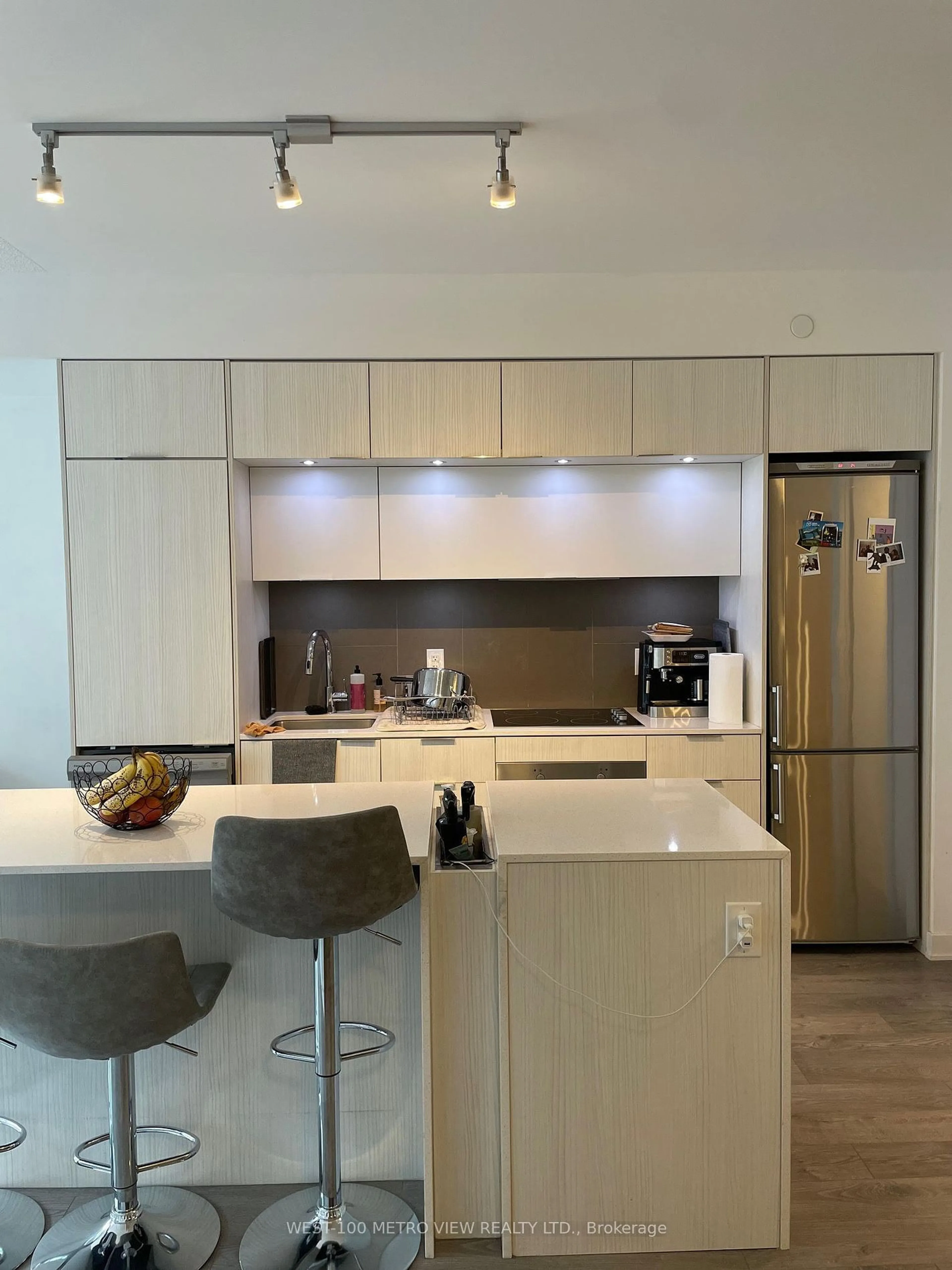 Contemporary kitchen, wood floors for 55 Regent Park Blvd #520, Toronto Ontario M5A 3H6