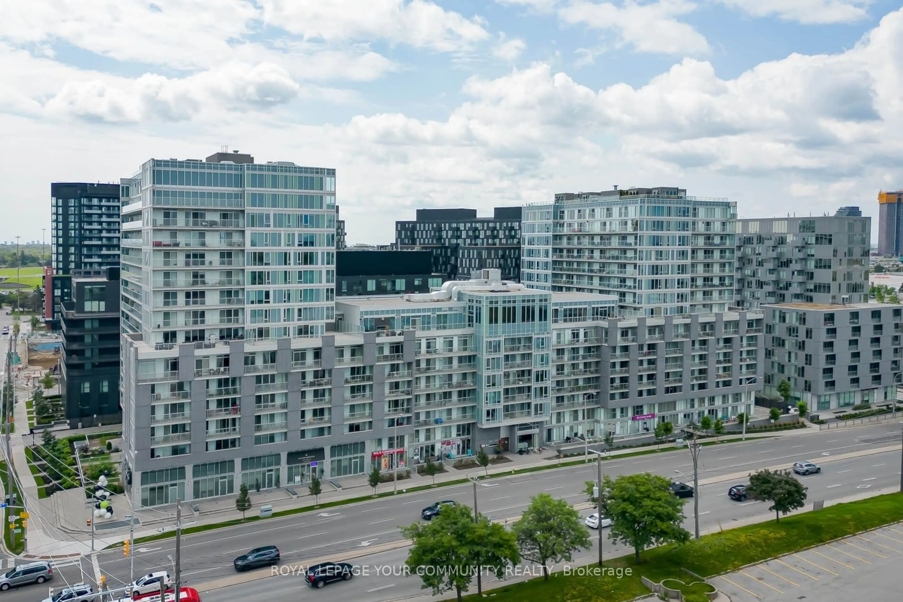 A pic from exterior of the house or condo, the view of city buildings for 565 Wilson Ave #421, Toronto Ontario M3H 0C6